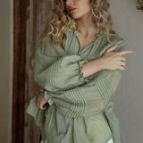 Poppy Blouse Fern - Boho blouse in sage green colourway featuring long sleeves with pintuck detail and tassel decoration at collar.