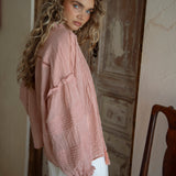Poppy Blouse Rose - side view showcasing pleated detail on sleeve and ruffled cuff