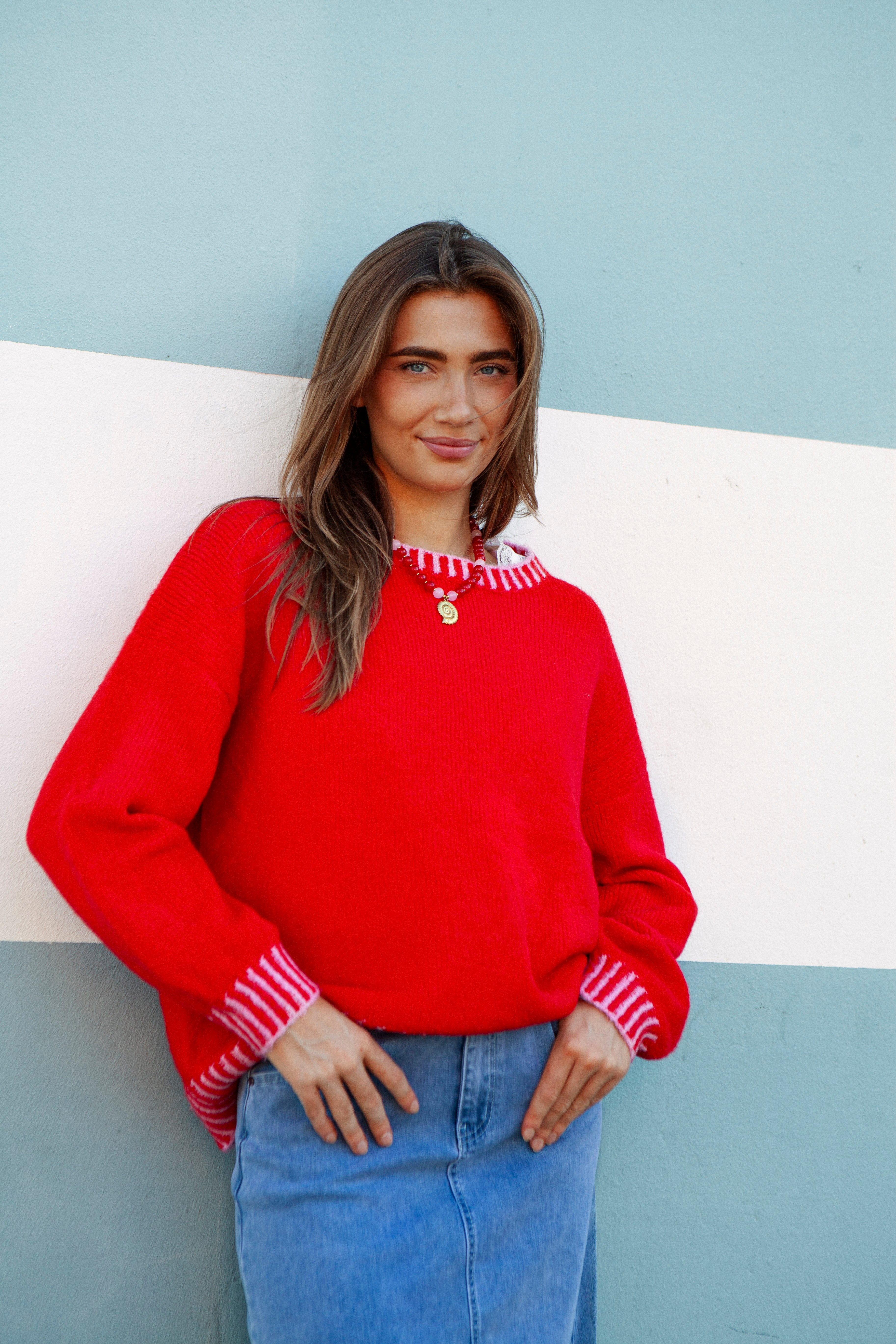 Racer Slouch Jumper - red sweater featuring contrasting pink trim at neck, cuffs and hem.