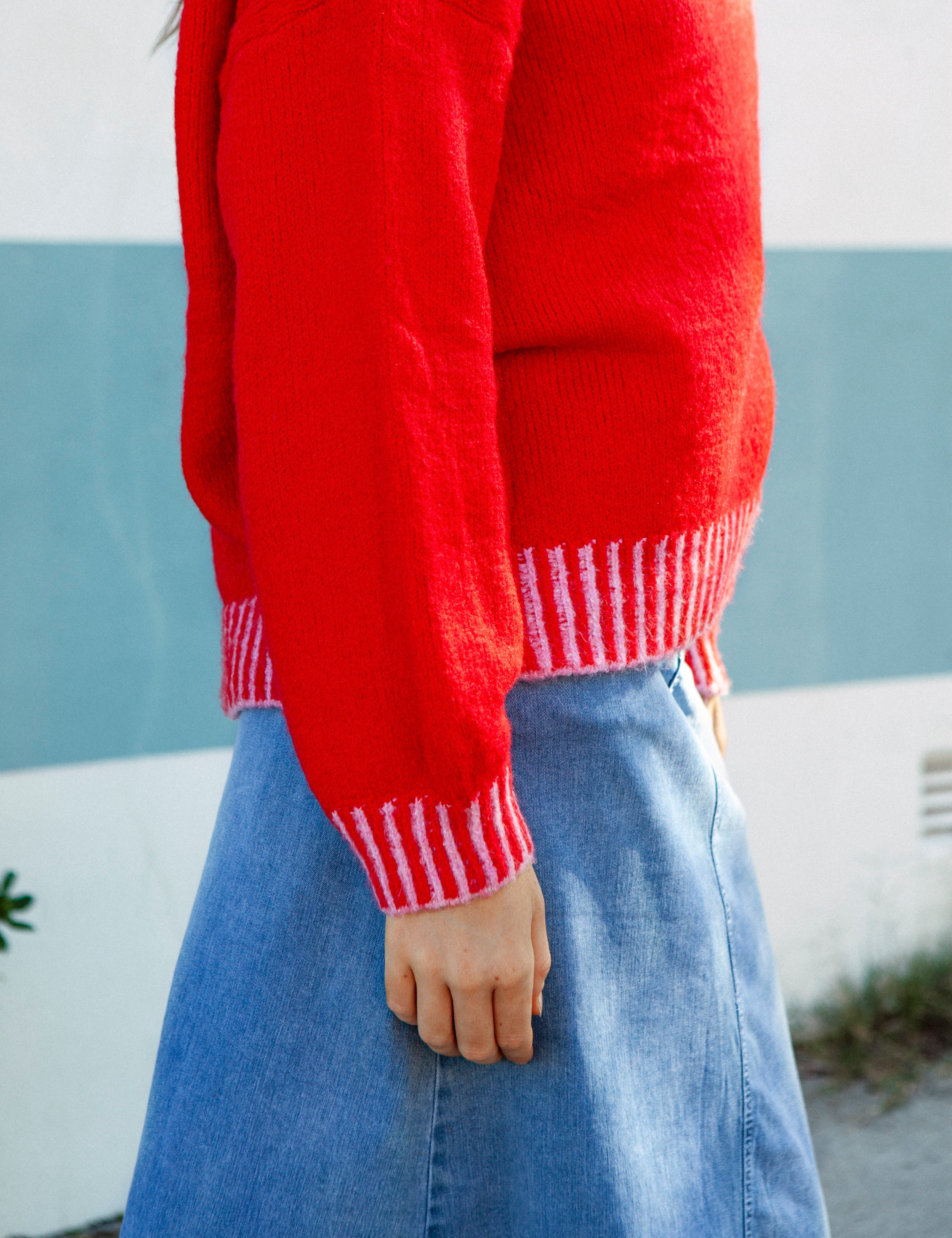Racer Slouch Jumper - side view showcasing pink contrast stitching