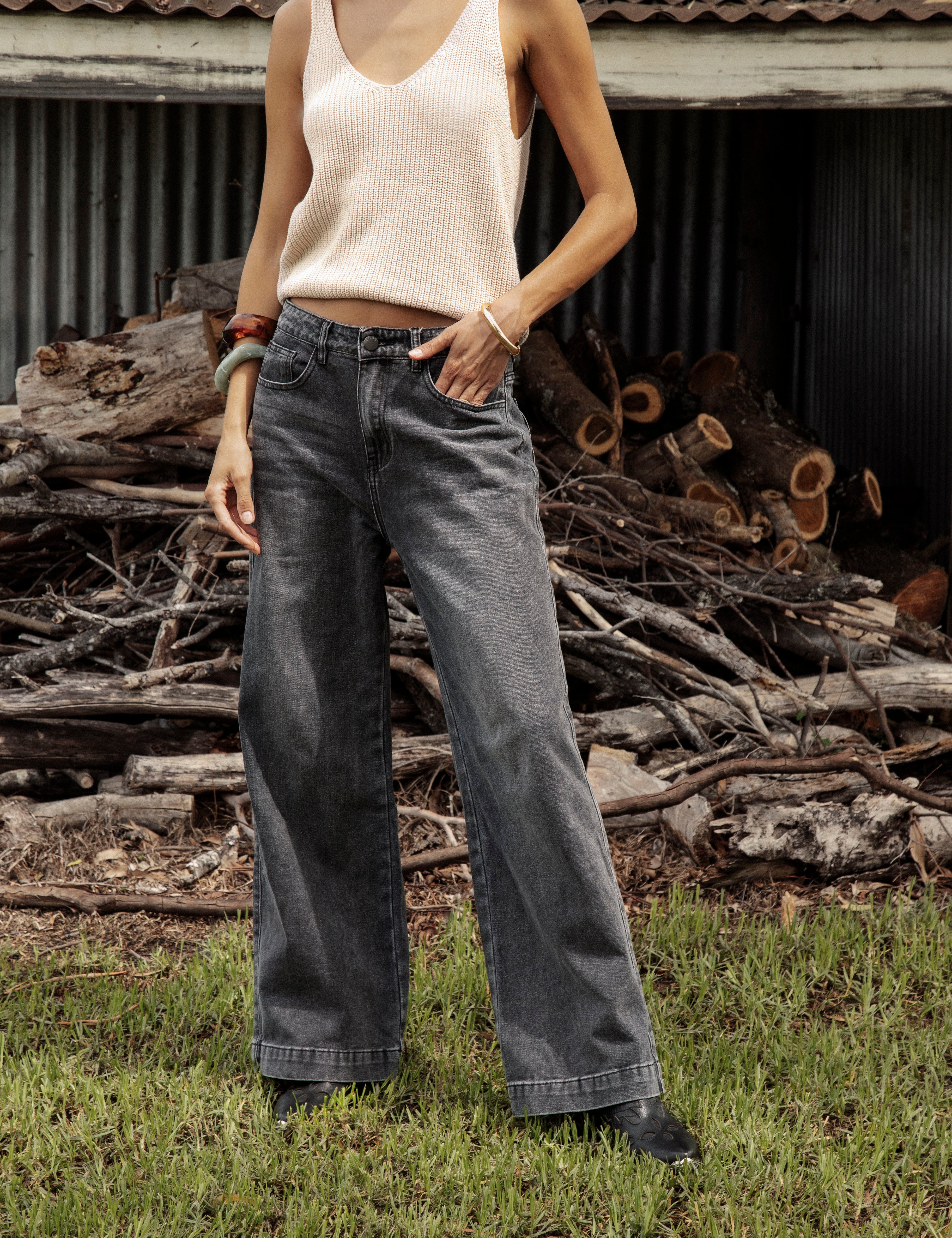 Renegade Denim Jean Charcoal featuring wide leg, relaxed fit and hem detail.