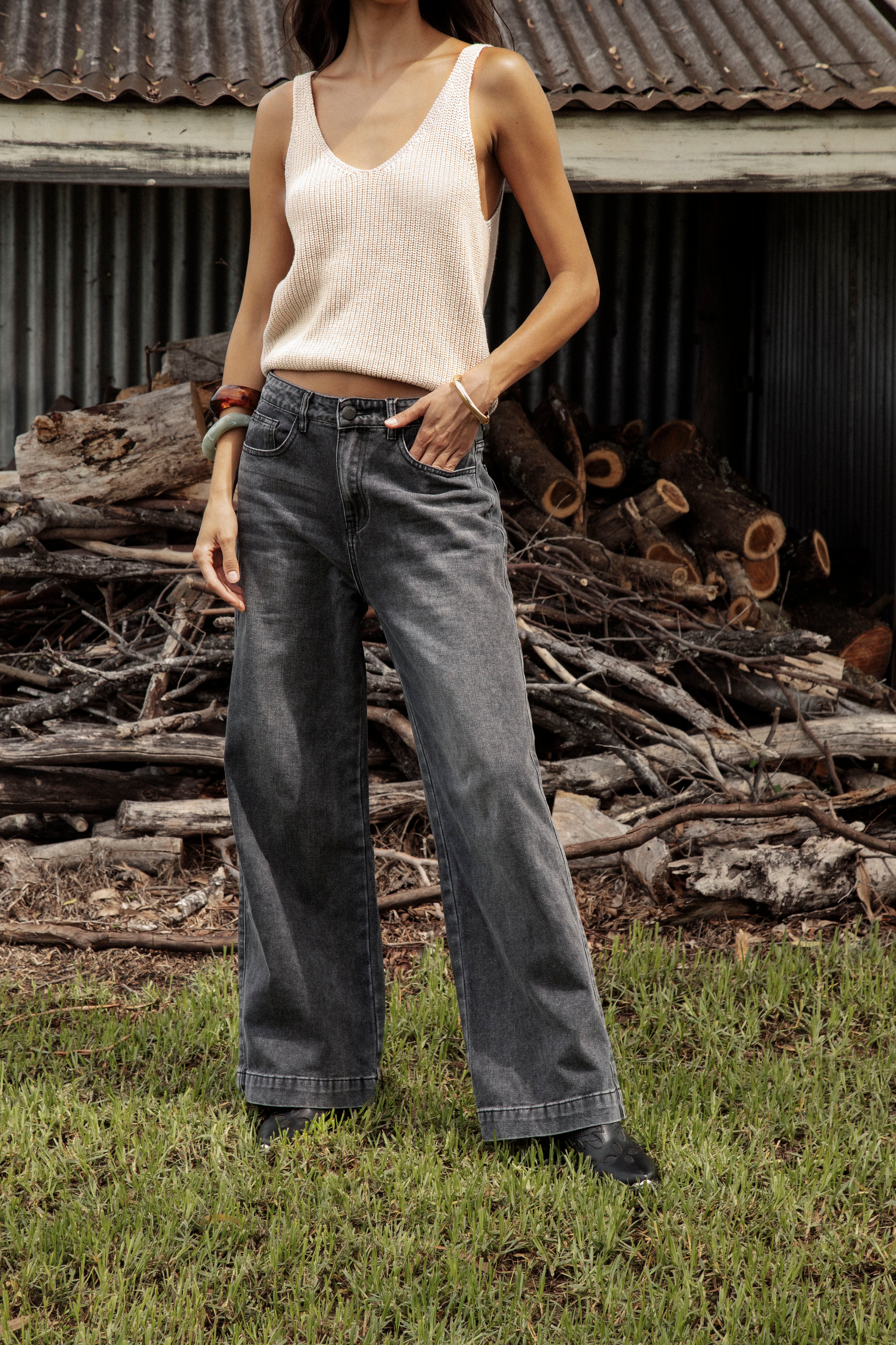 Renegade Denim Jean Charcoal featuring wide leg, relaxed fit and hem detail.