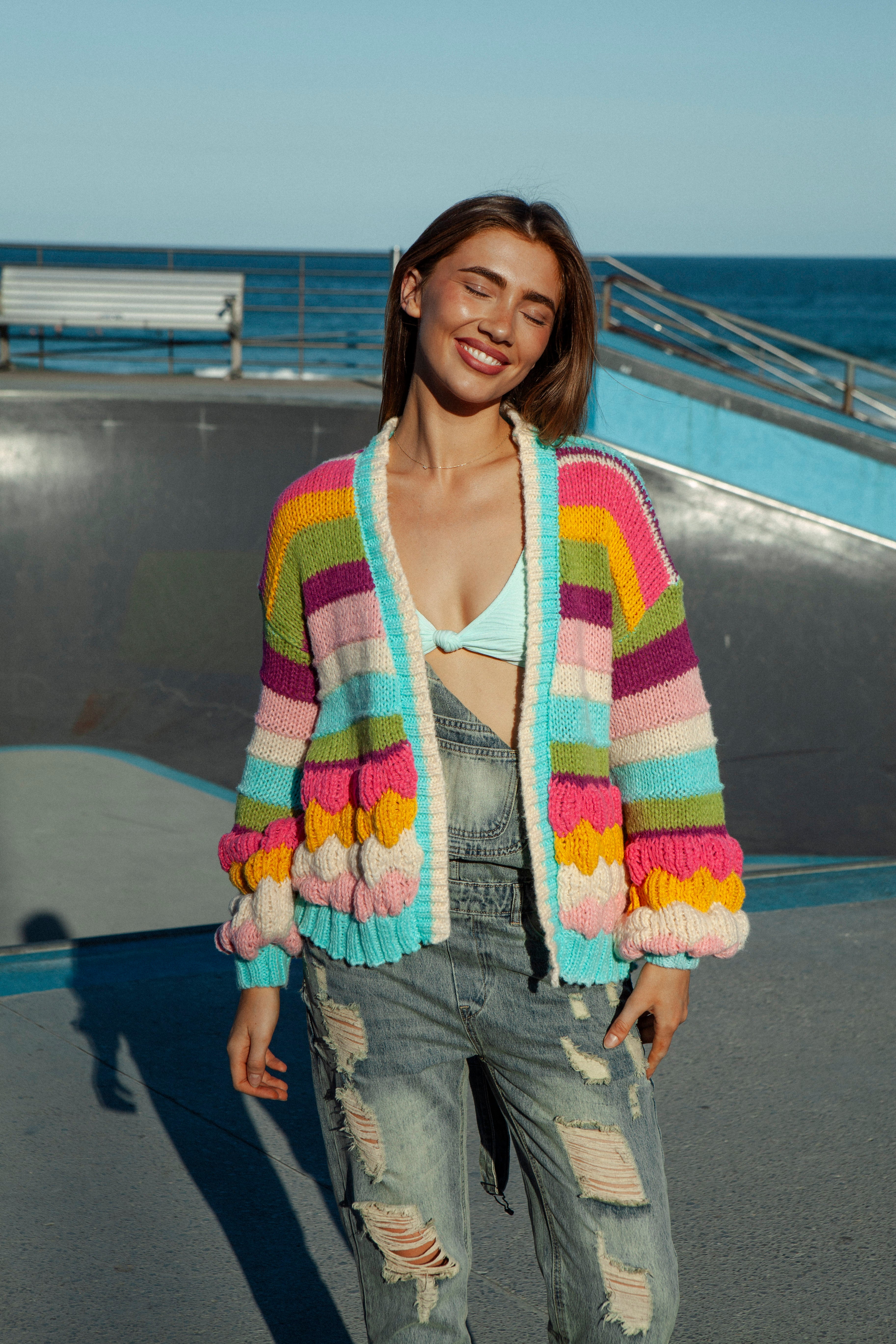 Retro Rainbow Stripe Cardigan featuring textured knit in rainbow stripe pattern