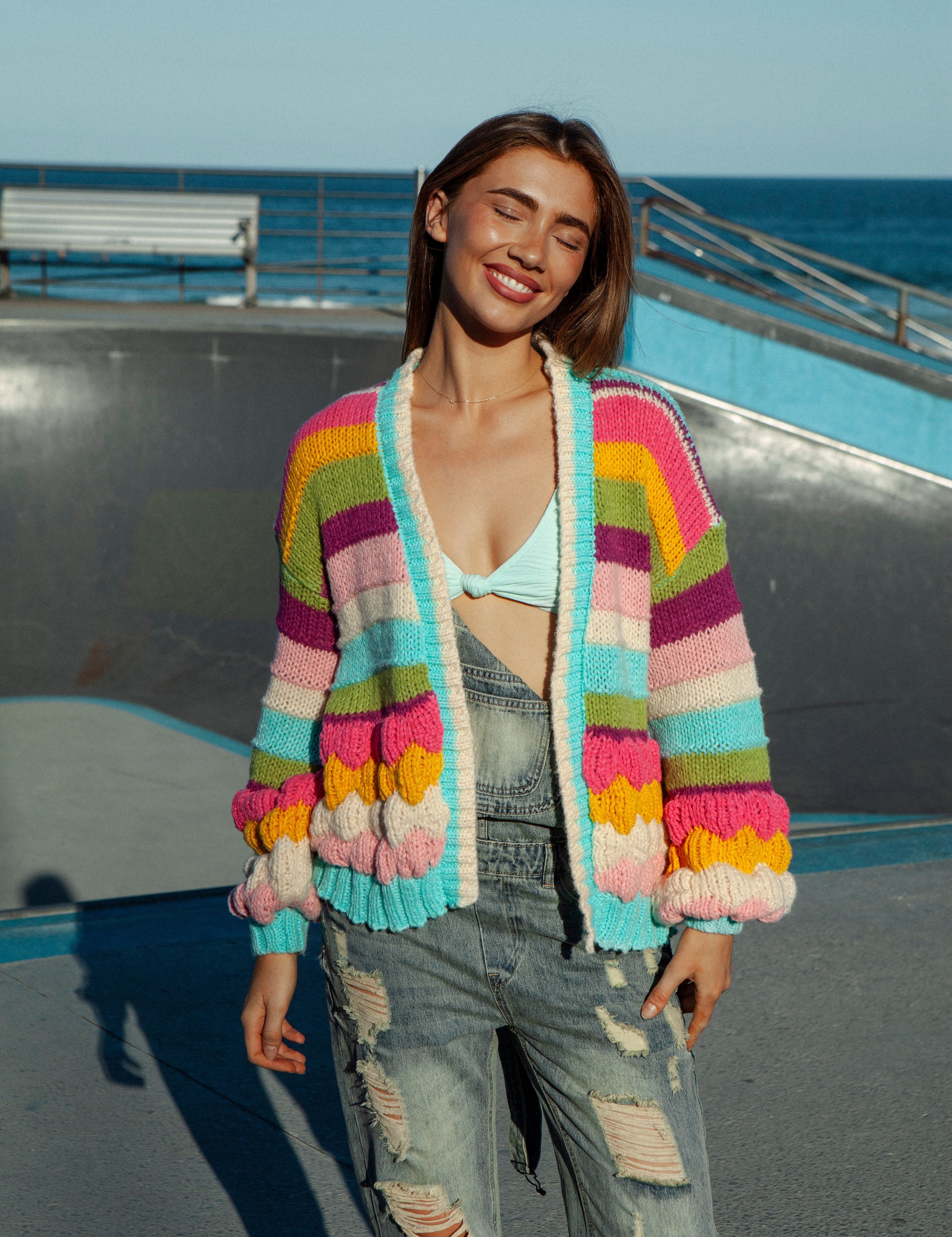 Retro Rainbow Stripe Cardigan featuring textured knit in rainbow stripe pattern