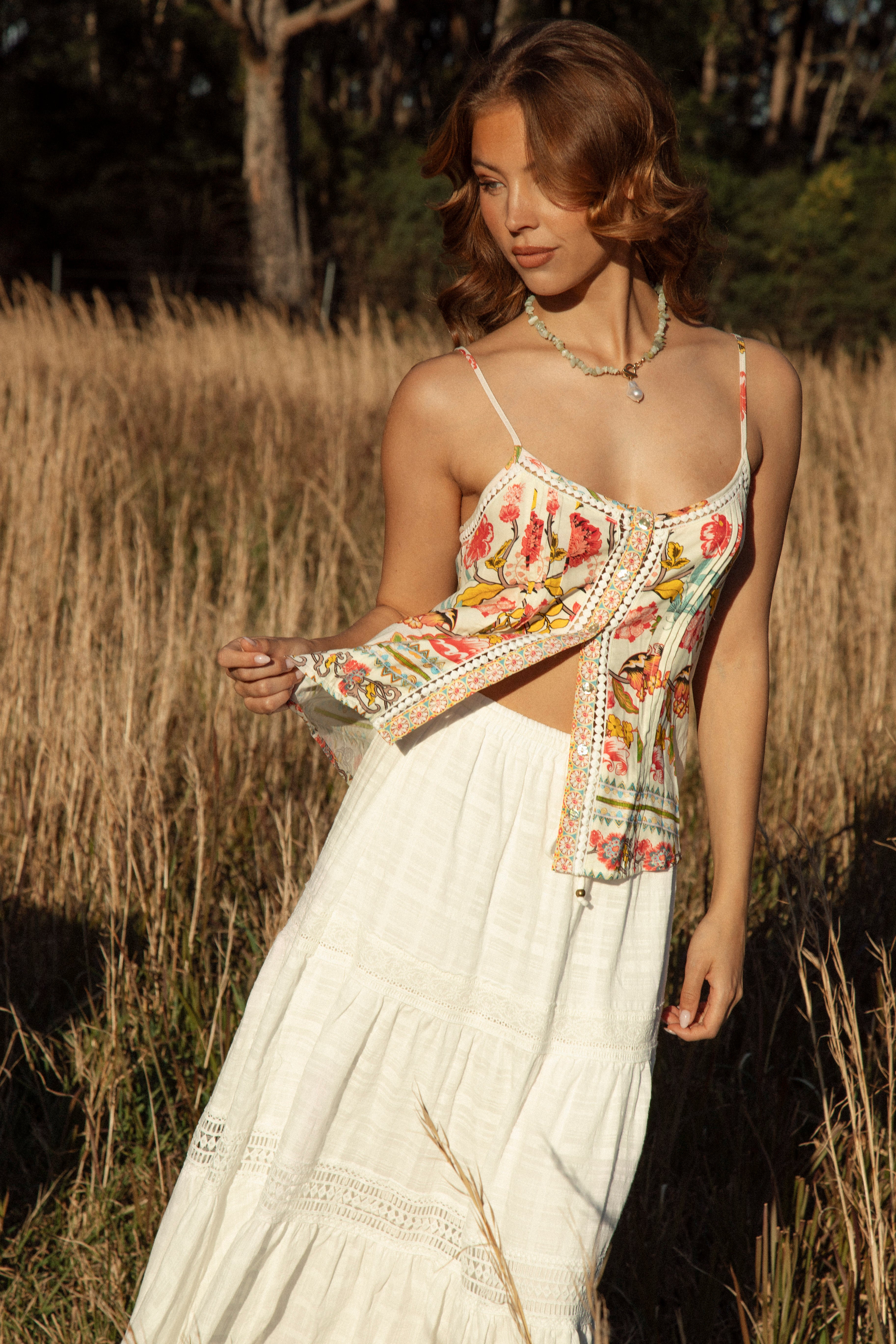 Rhea Camisole Golden Bloom showcasing button down style, spaghetti straps and boho floral print
