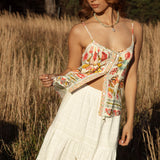 Rhea Camisole Golden Bloom showcasing button down style, spaghetti straps and boho floral print