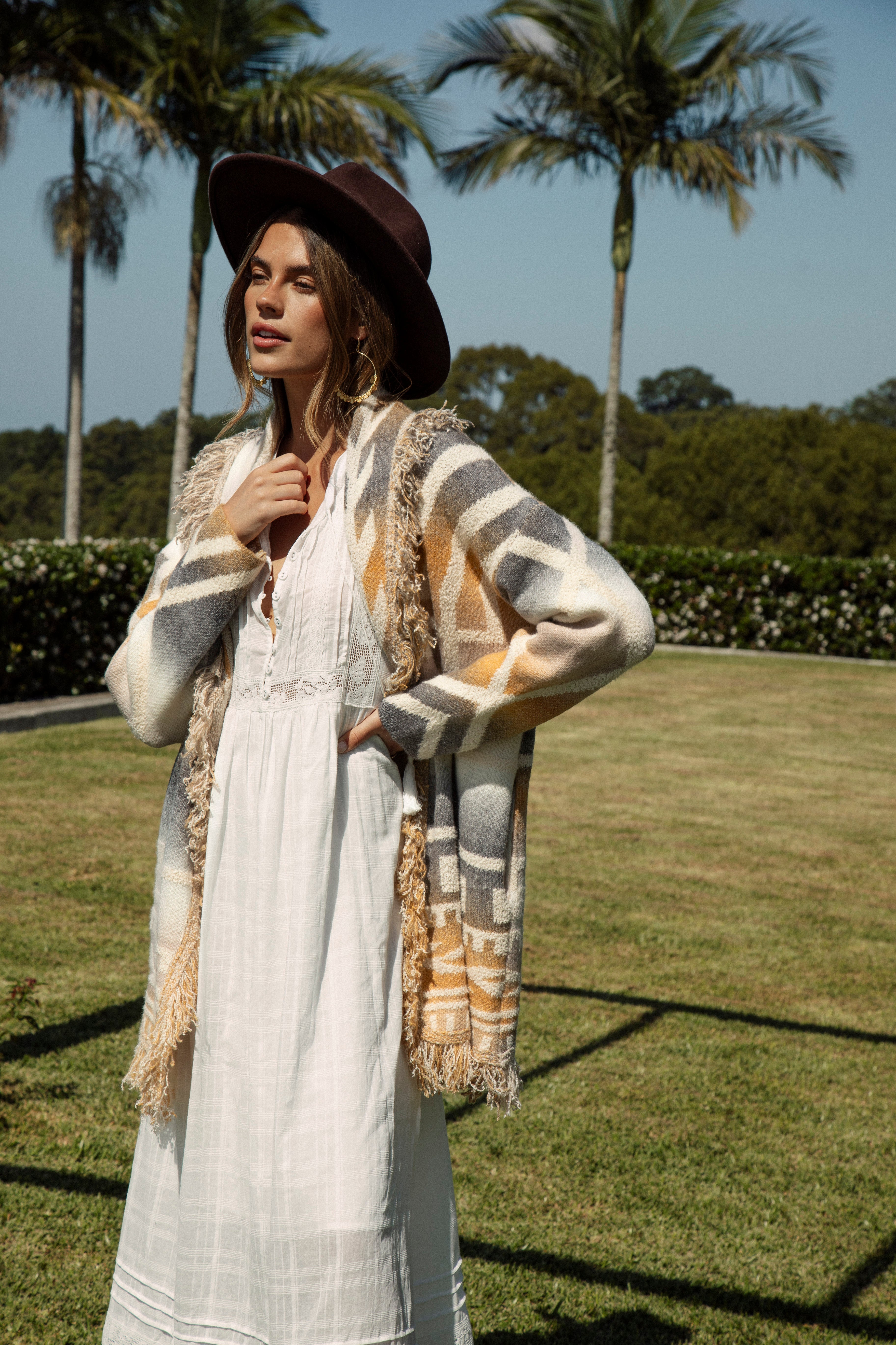 Riviera Fringe Cardigan Mustard features fringing on lapel and hem and true boho style