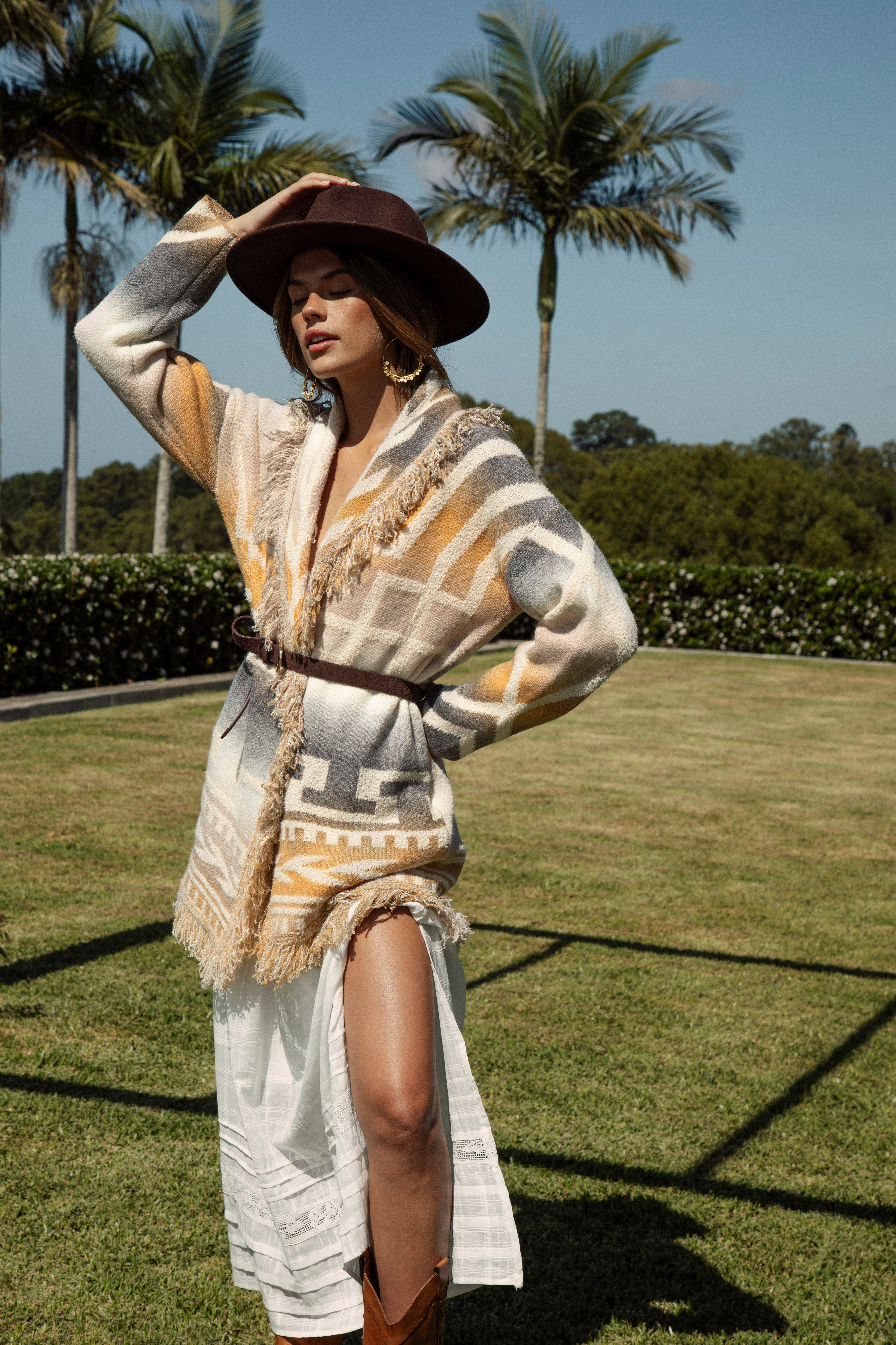 Riviera Fringe Cardigan Mustard features a true Boho pattern and style with statement fringing at hem