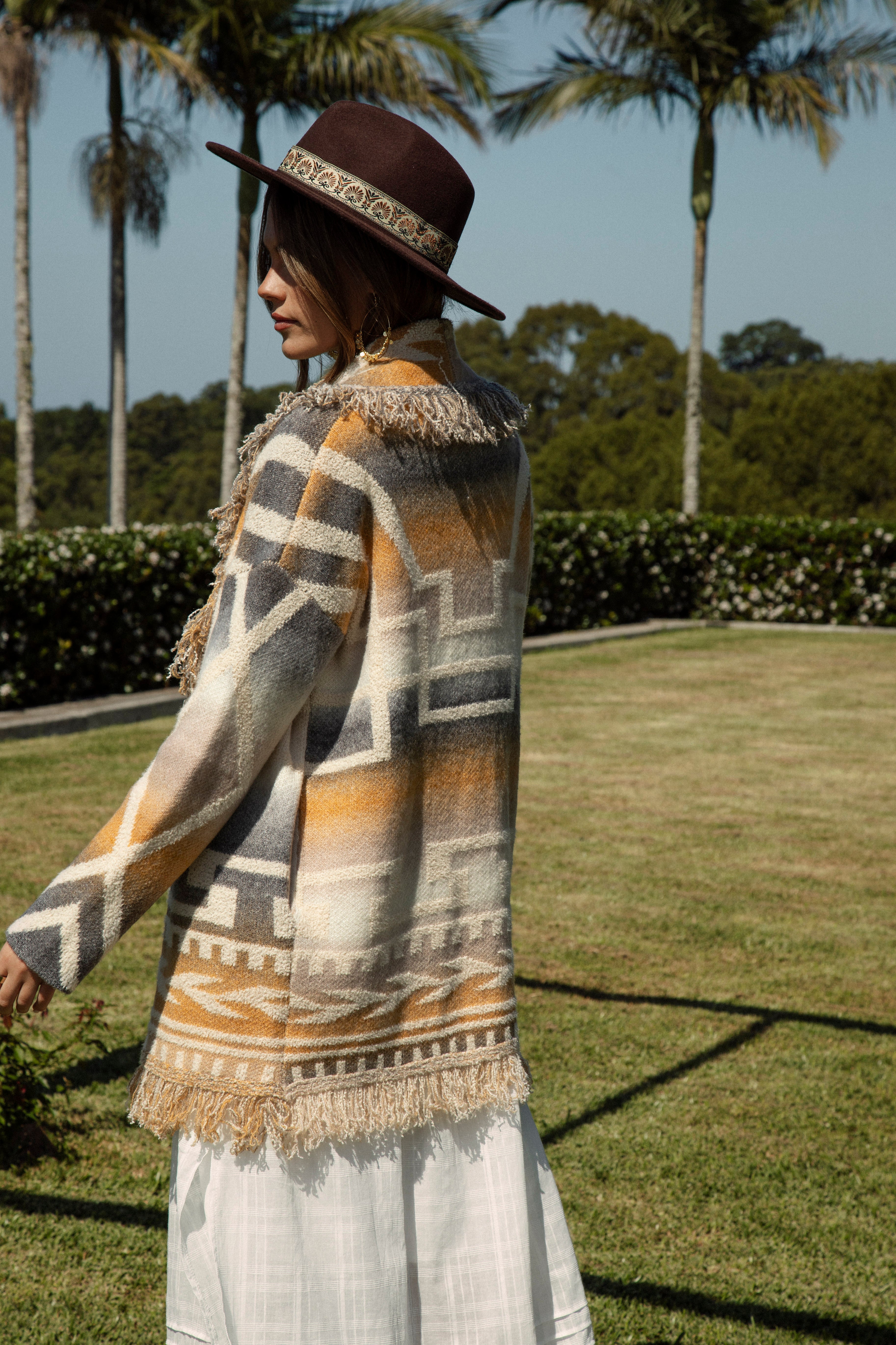 Riviera Fringe Cardigan Mustard - rear view showcasing Boho style Aztec inspired pattern