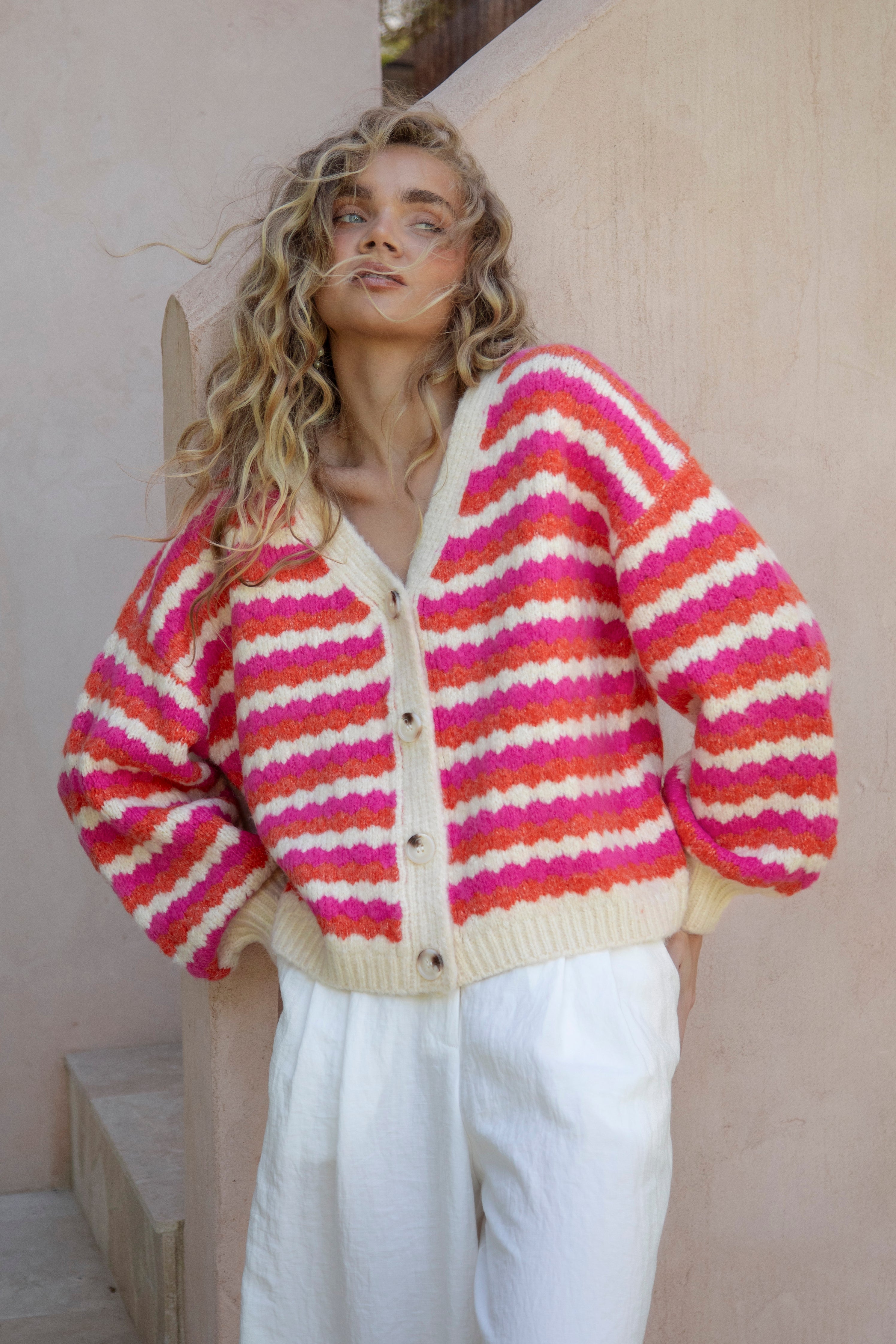 Roselle Stripe Cardigan - cropped cardigan with button down style and striking striped pattern in bright colours.