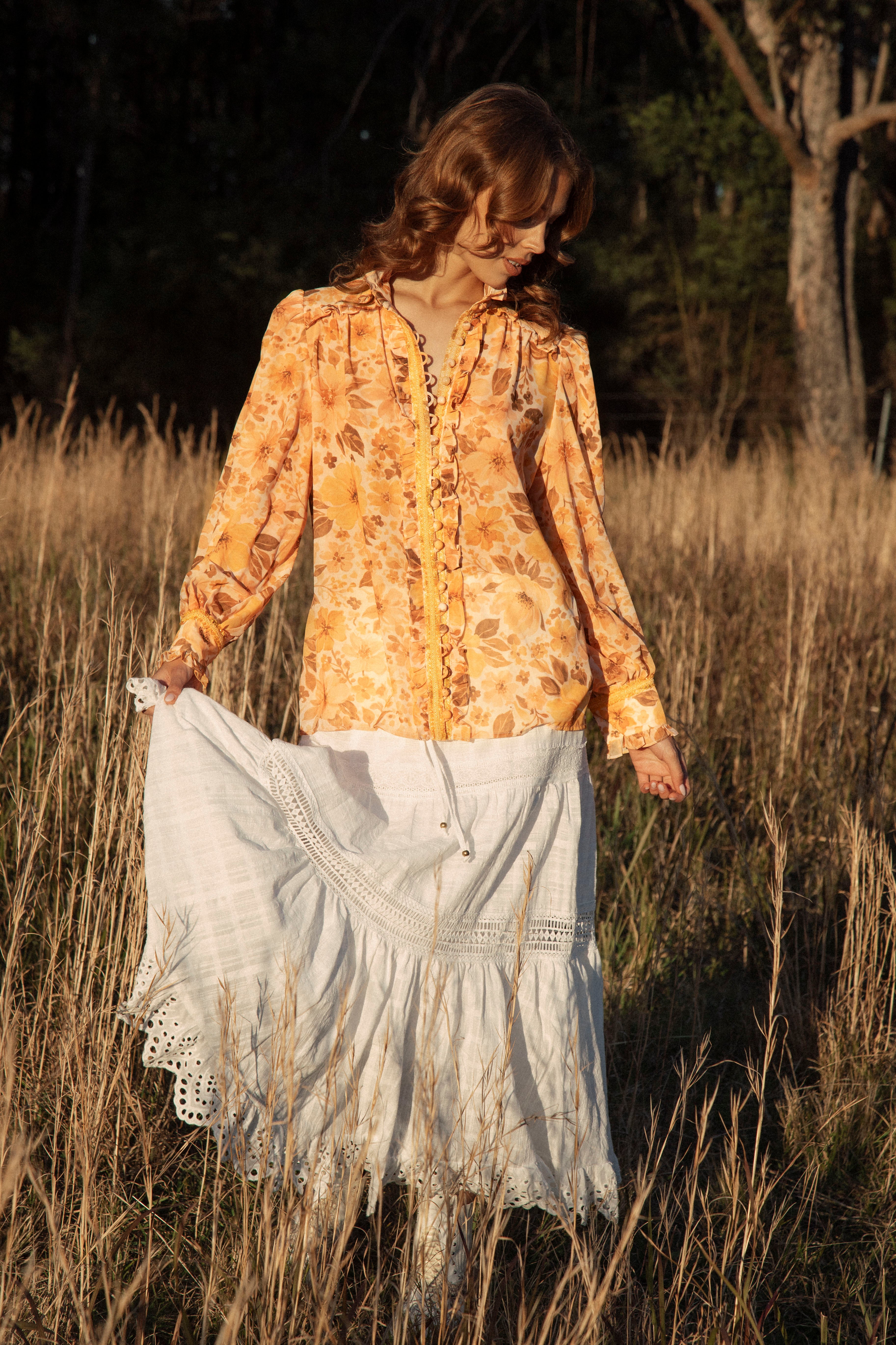 Saffron Dreams Blouse featuring button down style with fabric buttons and loop closure
