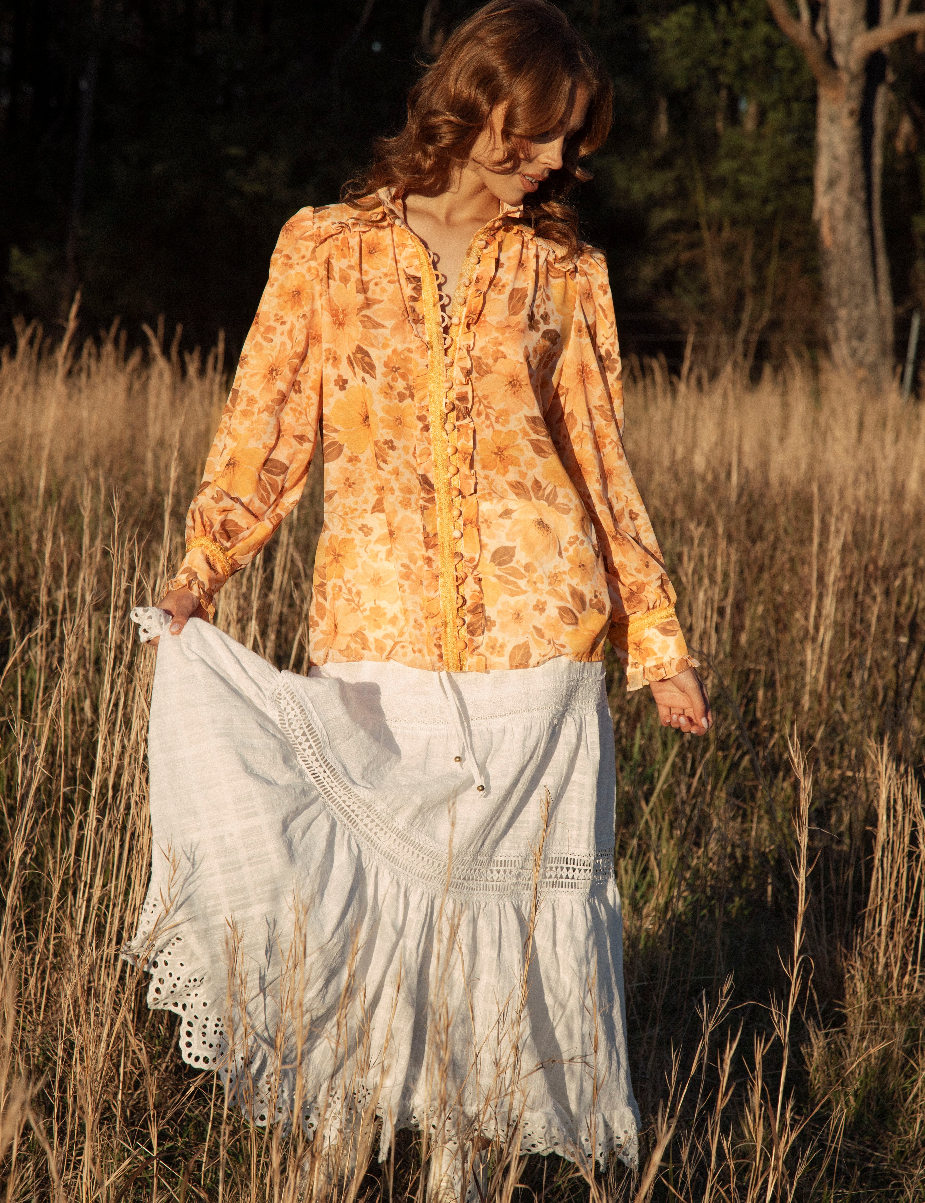 Saffron Dreams Blouse featuring button down style with fabric buttons and loop closure
