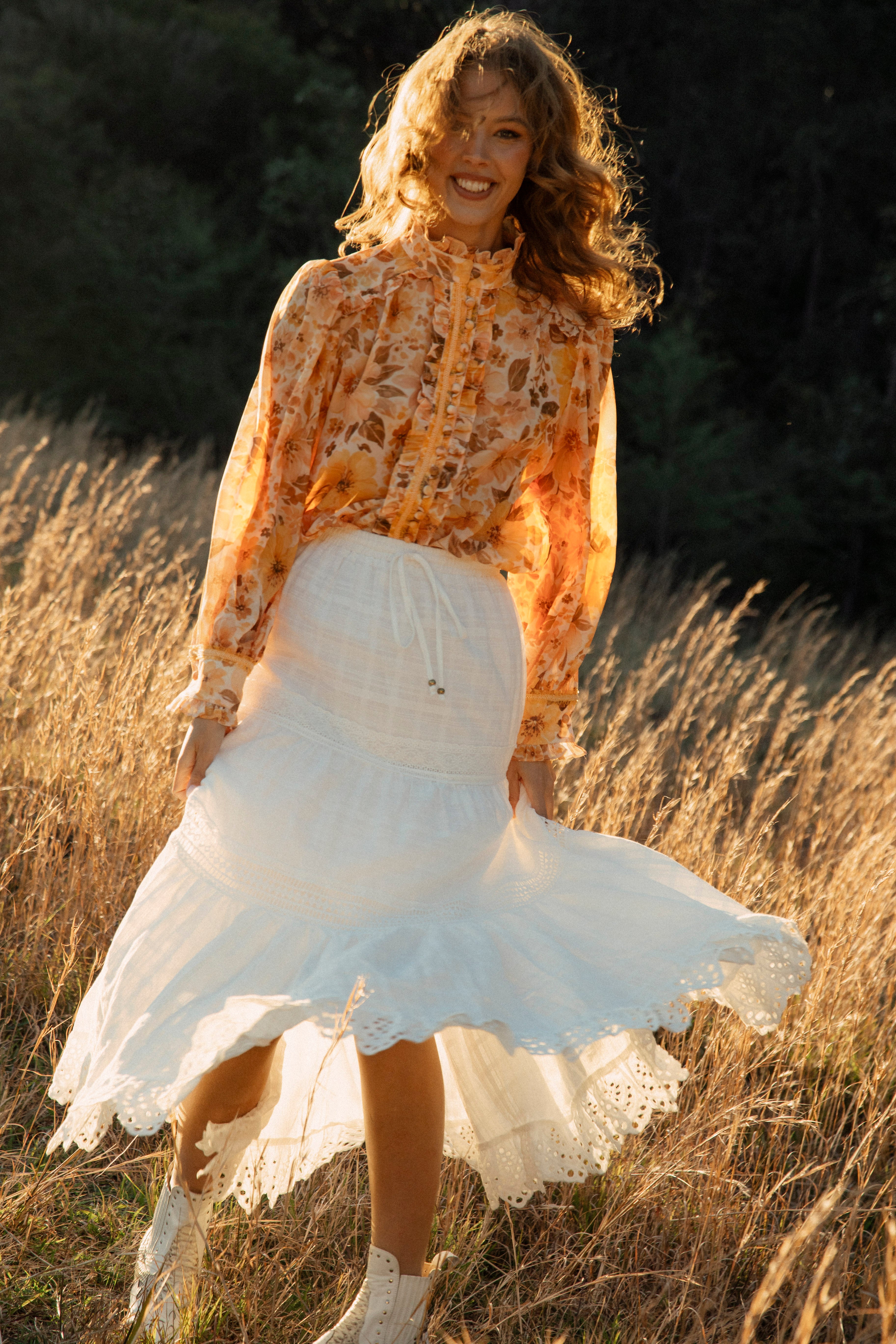 Saffron Dreams Blouse worn with white maxi skirt and white traveller boots