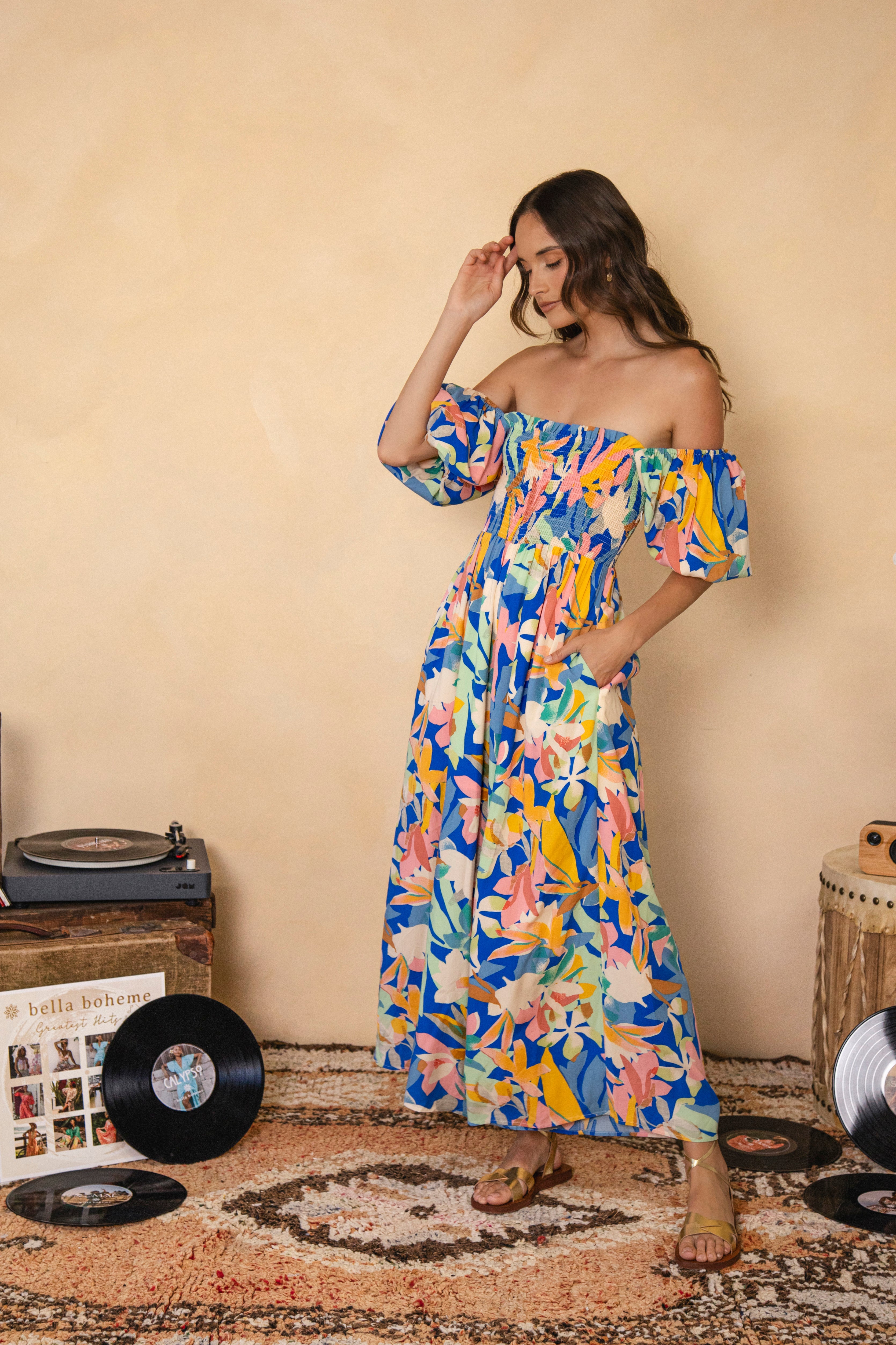 Sailors Jumpsuit Mediterranean featuring shirred bodice, puff sleeves, pockets and wide leg style