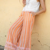Sandi Stripe Pant Goldie featuring orange and pink striped pattern, lightweight fabric and pockets