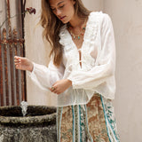 Sicilia Blouse features long sleeves with elasticised cuffs and ruffled detail at bodice