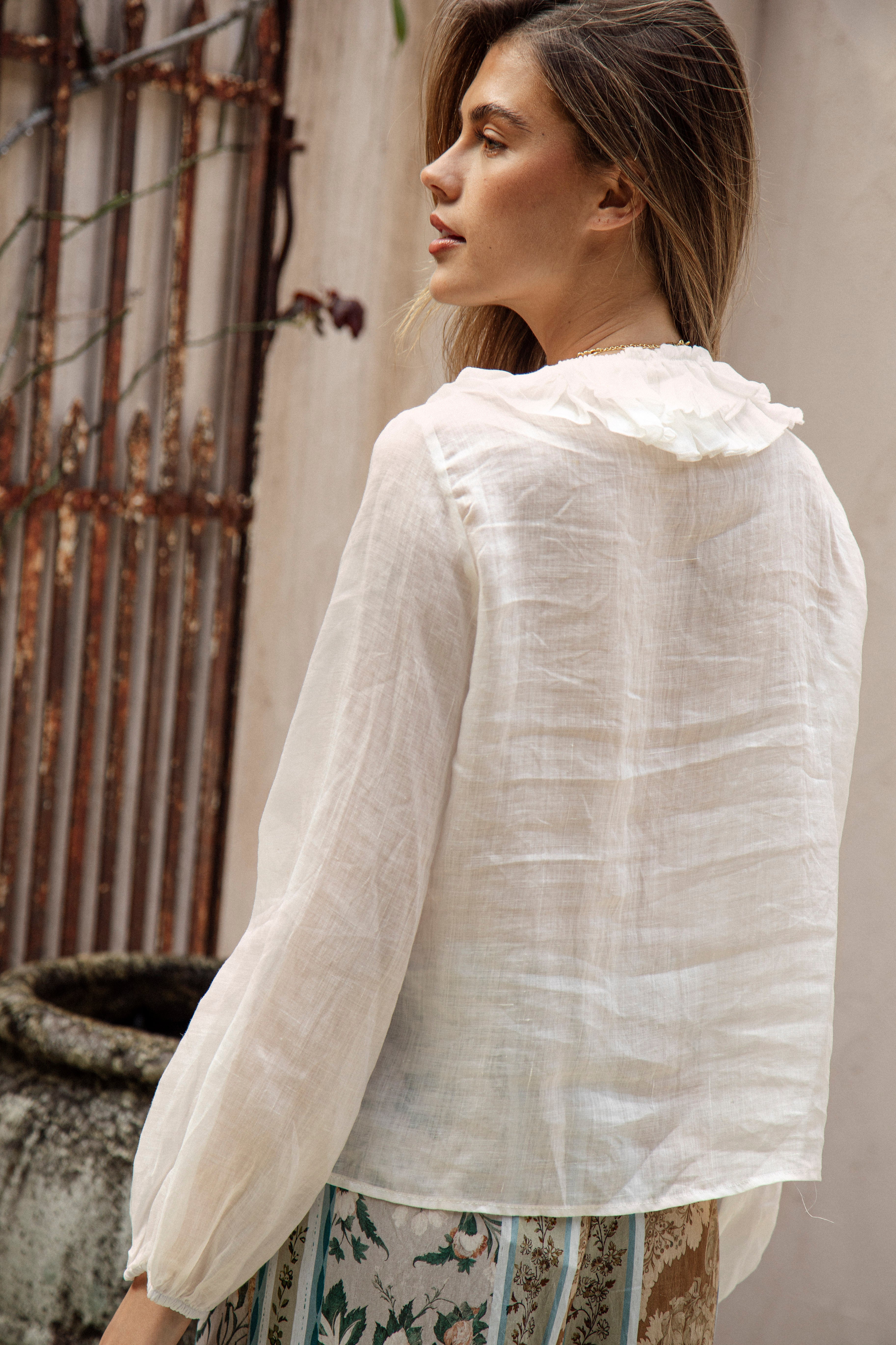 Sicilia Blouse - rear view showcasing ruffle collar and long sleeve style