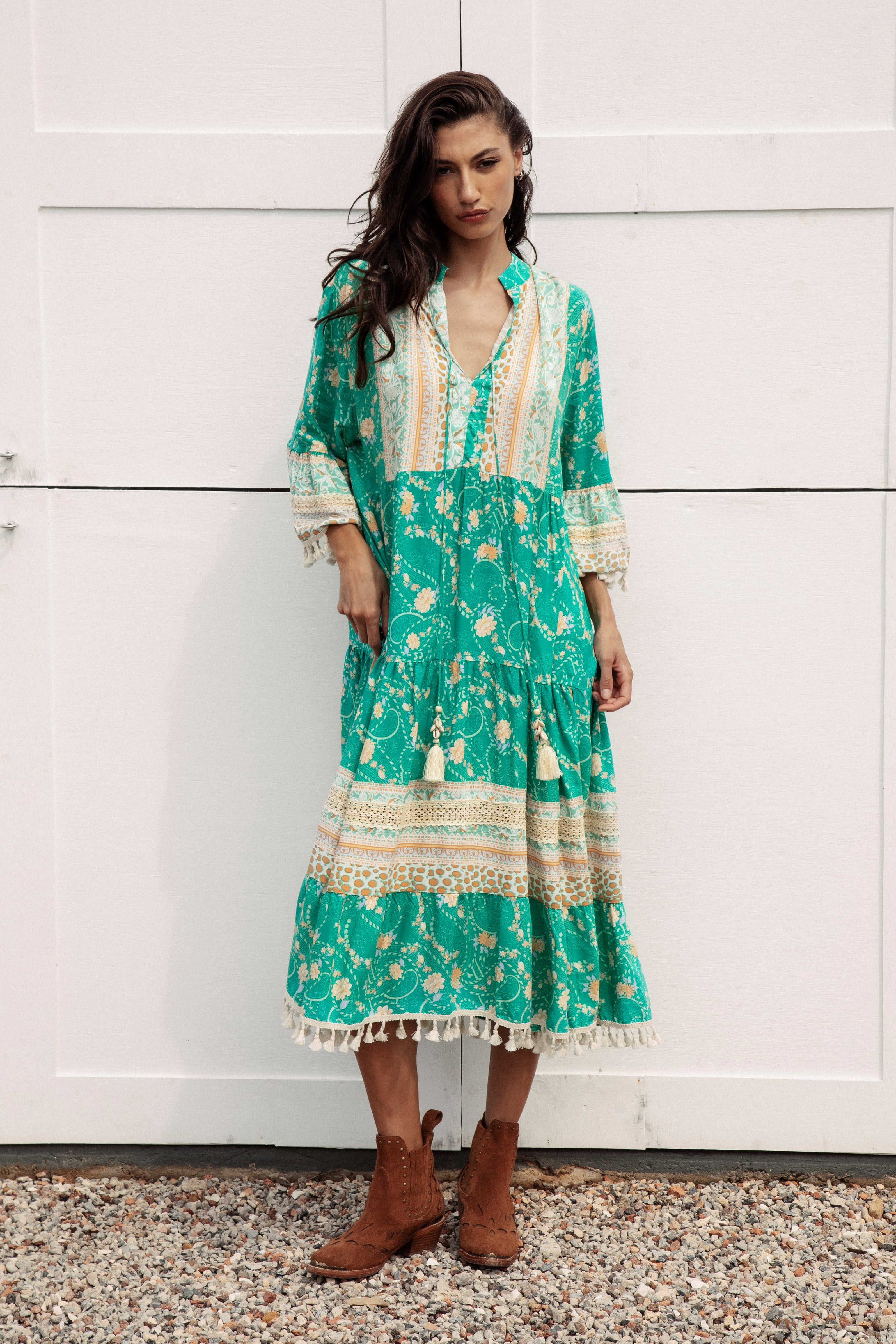 Soiree Midi Dress - Jewel. Stunning green Boho dress in green colourway with contrasting cream floral pattern and tassel embellishments.