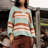 Soren V Neck Jumper Pistachio is a soft easy to wear sweater featuring striped pattern in shades of blue, cream and brown.