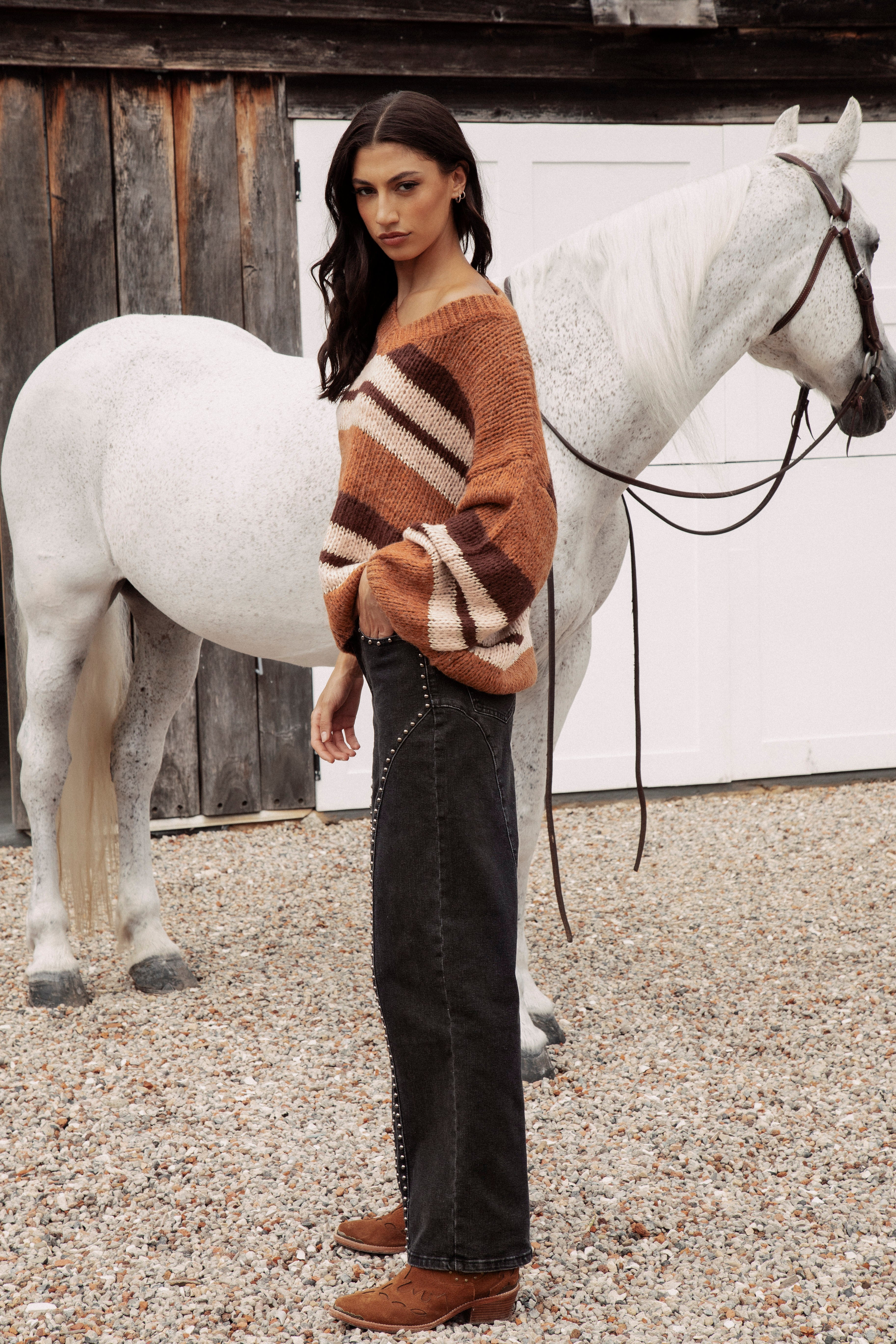 Soren V Neck Knit Rust side view showcasing striped pattern