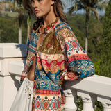 Sunkissed Blouse Olea featured stand collar and Bohemian print in shades of red, ivory, blue and gold