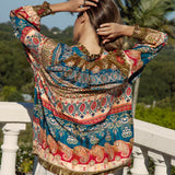 Sunkissed Blouse Olea showcasing long sleeves with shirred cuff and mandarin style collar