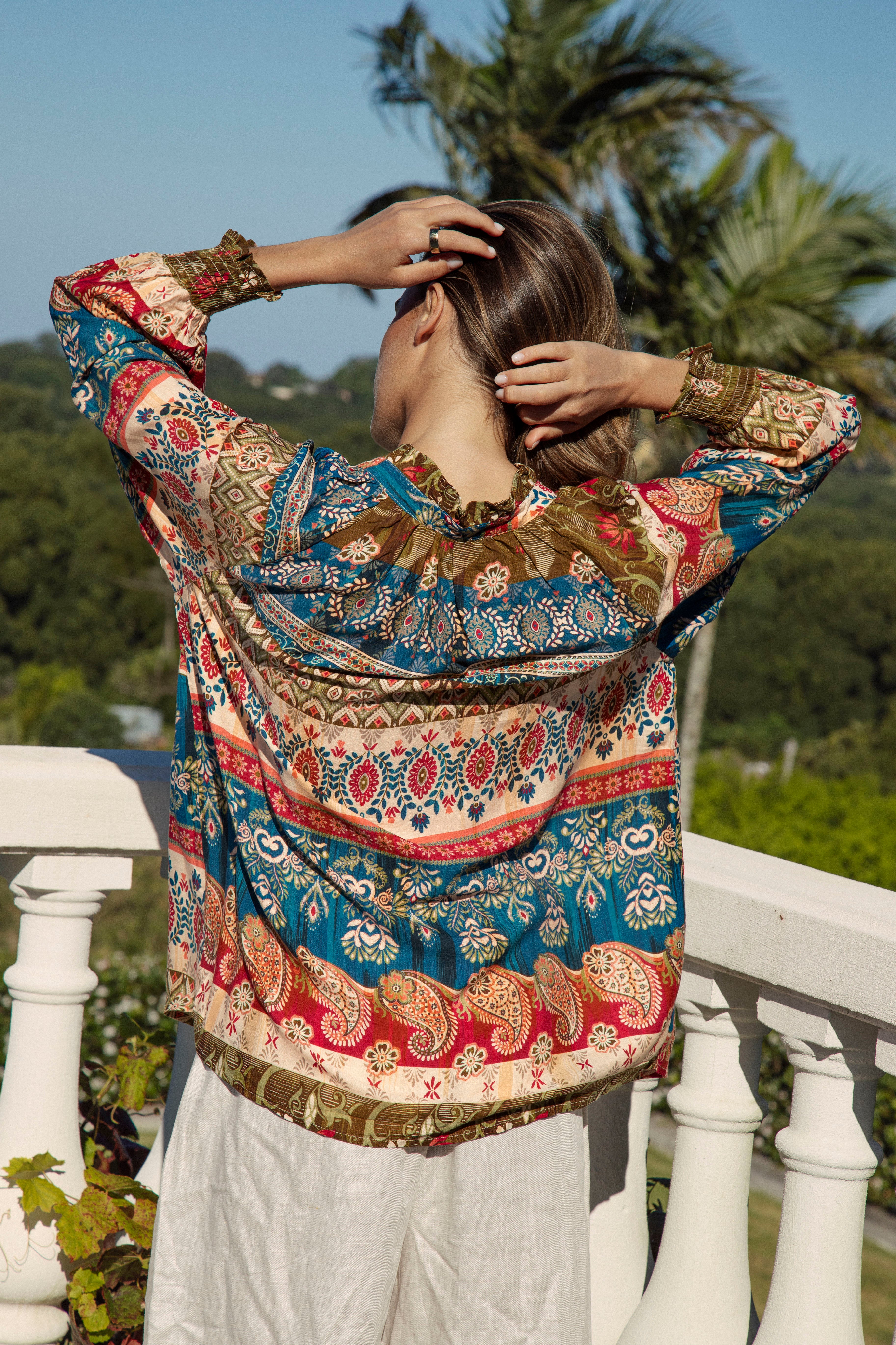 Sunkissed Blouse Olea showcasing long sleeves with shirred cuff and mandarin style collar