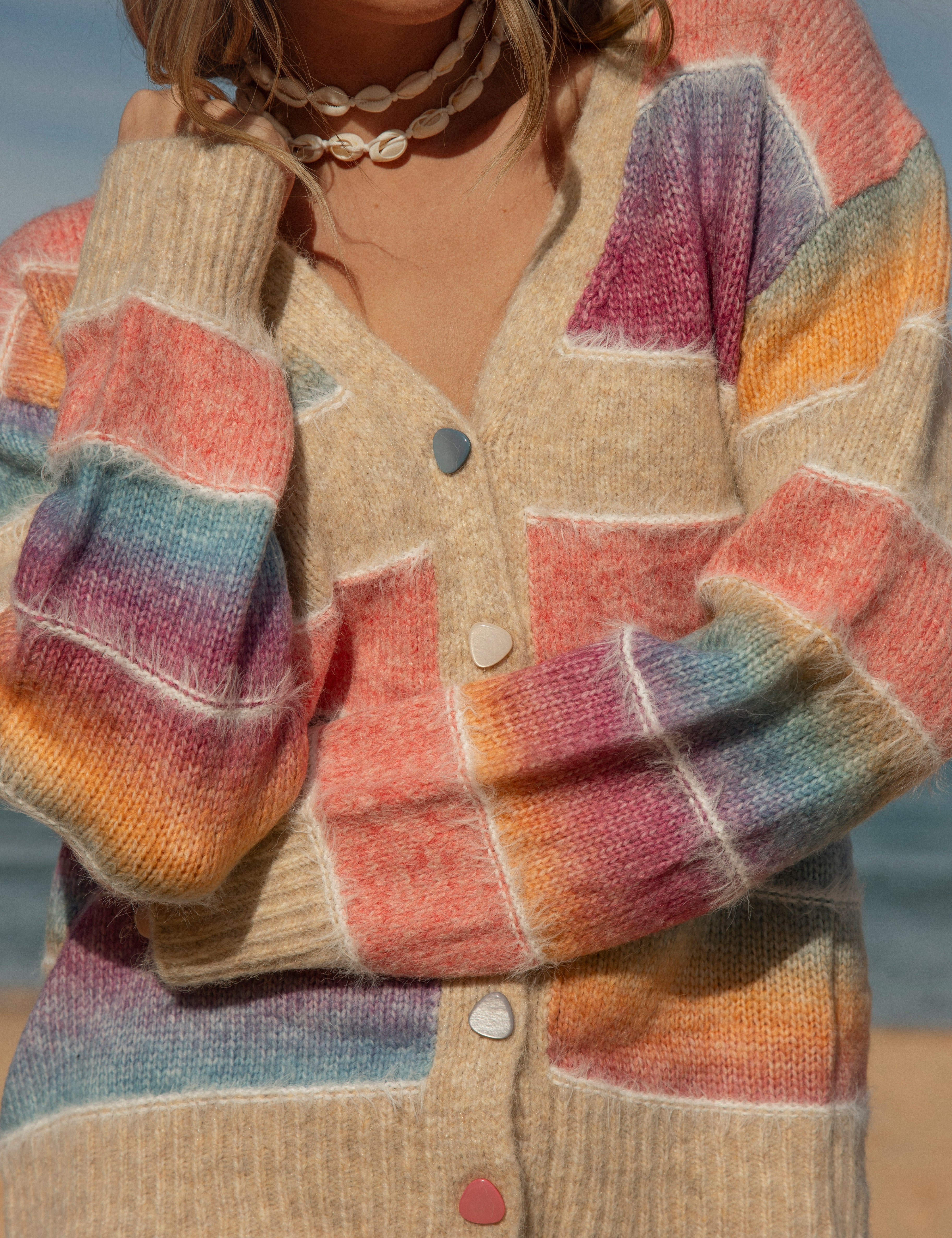 Sunshine State of Mind Cardigan features rainbow stripe pattern, cute multi coloured buttons and cosy feel.