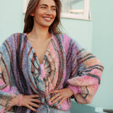 Sweet Escape Knit - multi-coloured sweater featuring knot at front and oversized style