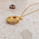 The Golden Compass Necklace side view showcasing jewel embellishment