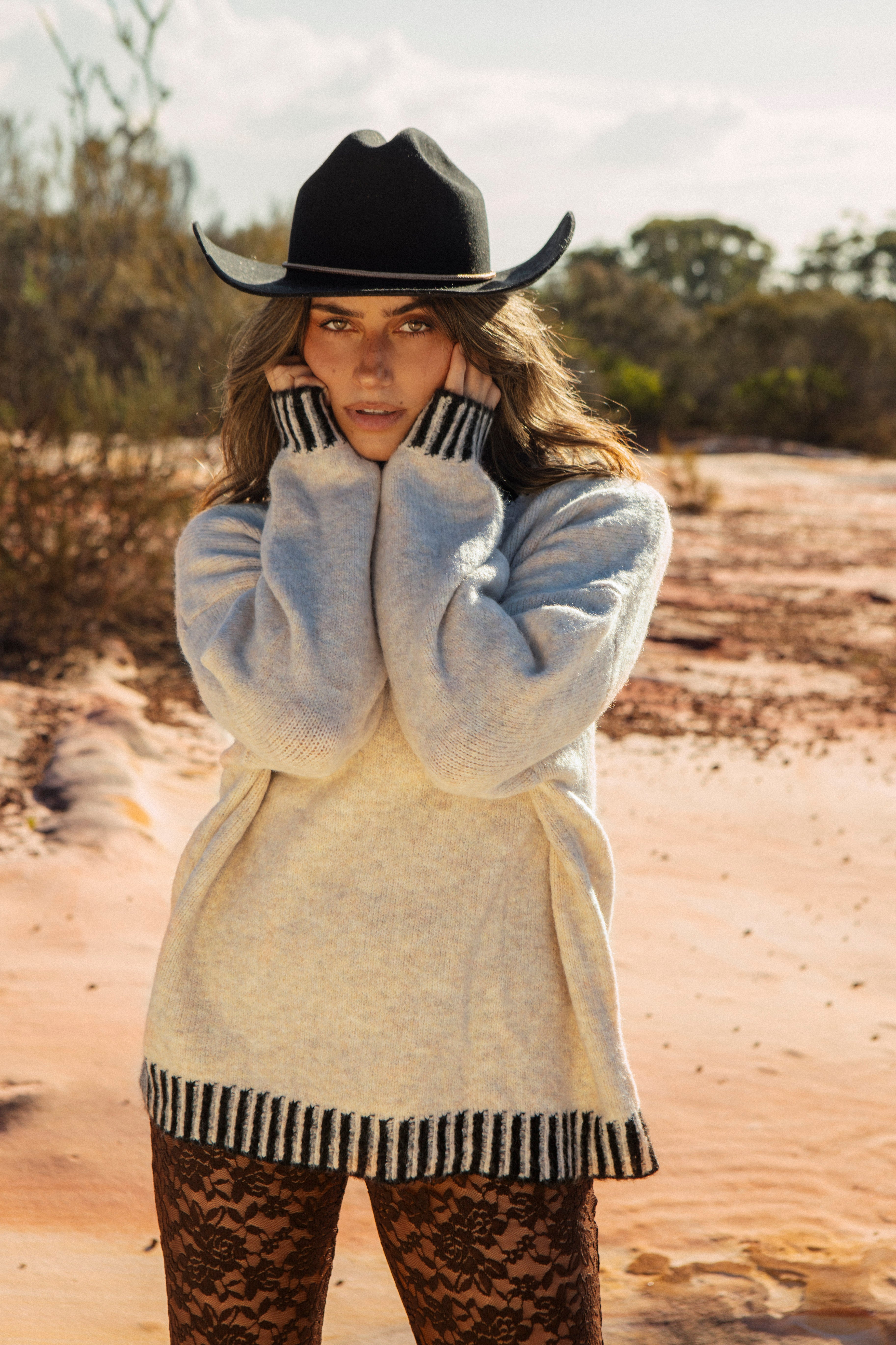 Tilly Knit - lovely warm cream coloured jumper with contrast black stitching on cuff, neck and hemline.