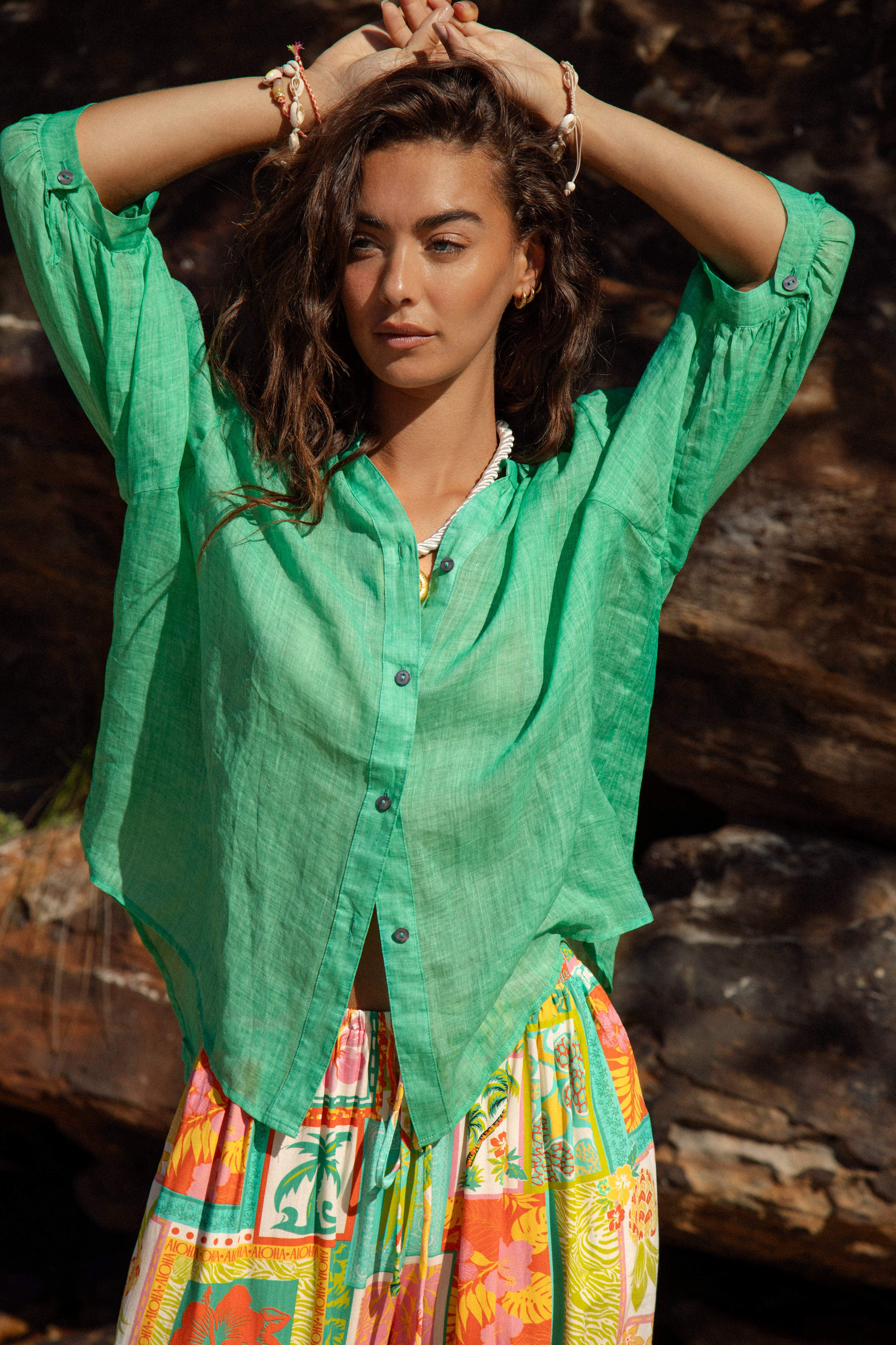 Under The Palm Shirt Seafoam is a lightweight cotton blouse in green colourway featuring mandarin collar