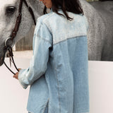 Untamed Denim Shirt - rear view showcasing delicate white embroidery.