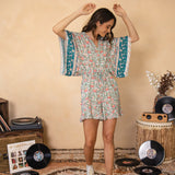 Vida Playsuit featuring button down style and drawstring waist