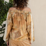 Villa Rosa Blouse Tuscan - rear view showcasing off the shoulder style and lace details on sleeves