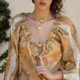 Villa Rosa Blouse Tuscan - showcasing v-neck style when worn on shoulders