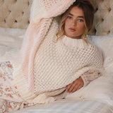Vintage Romance Knit is a chunky style oversized sweater with pink cream and beige hues