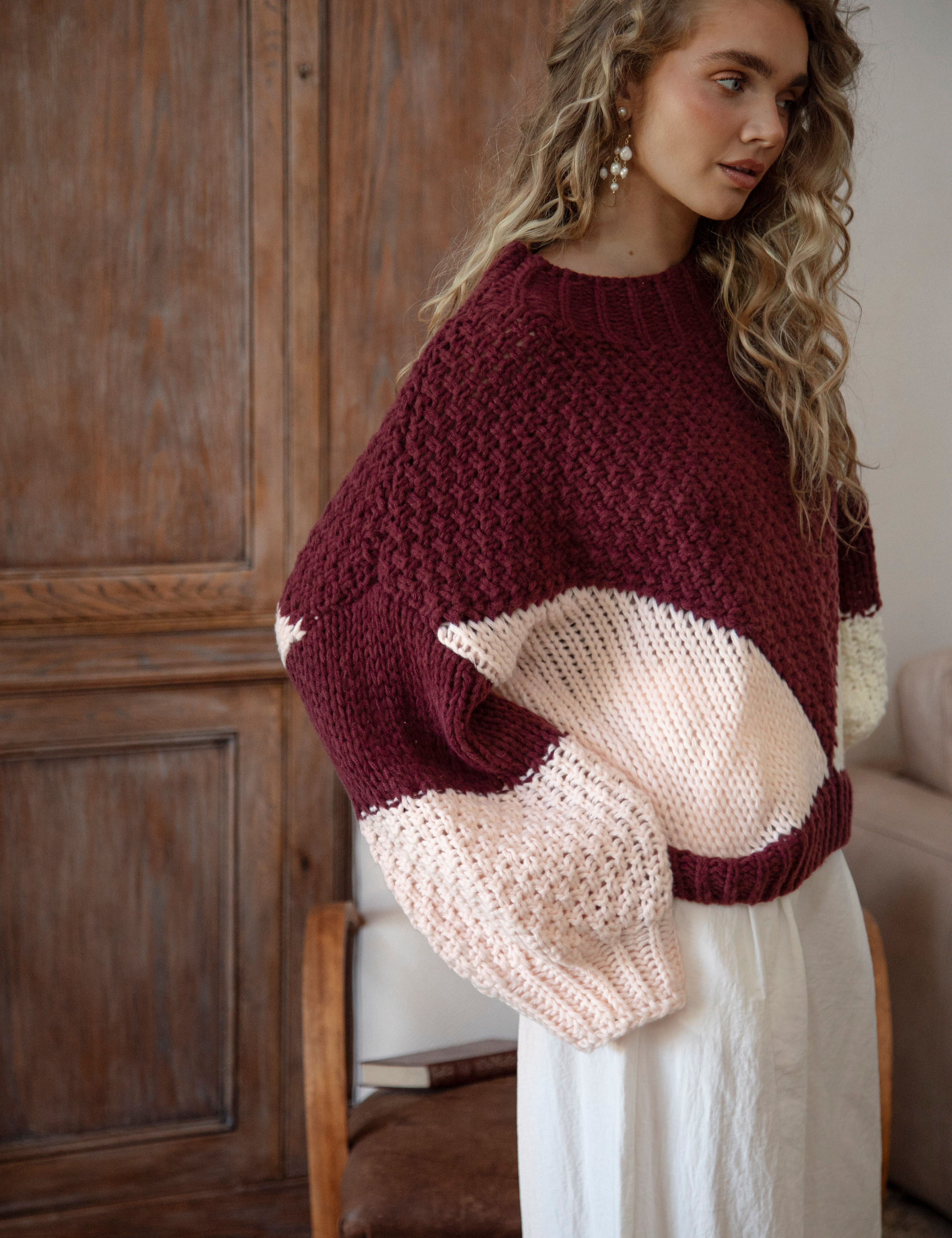 Vintage Romance Knit Vino featured textured knit, geometric pattern and oversized style.