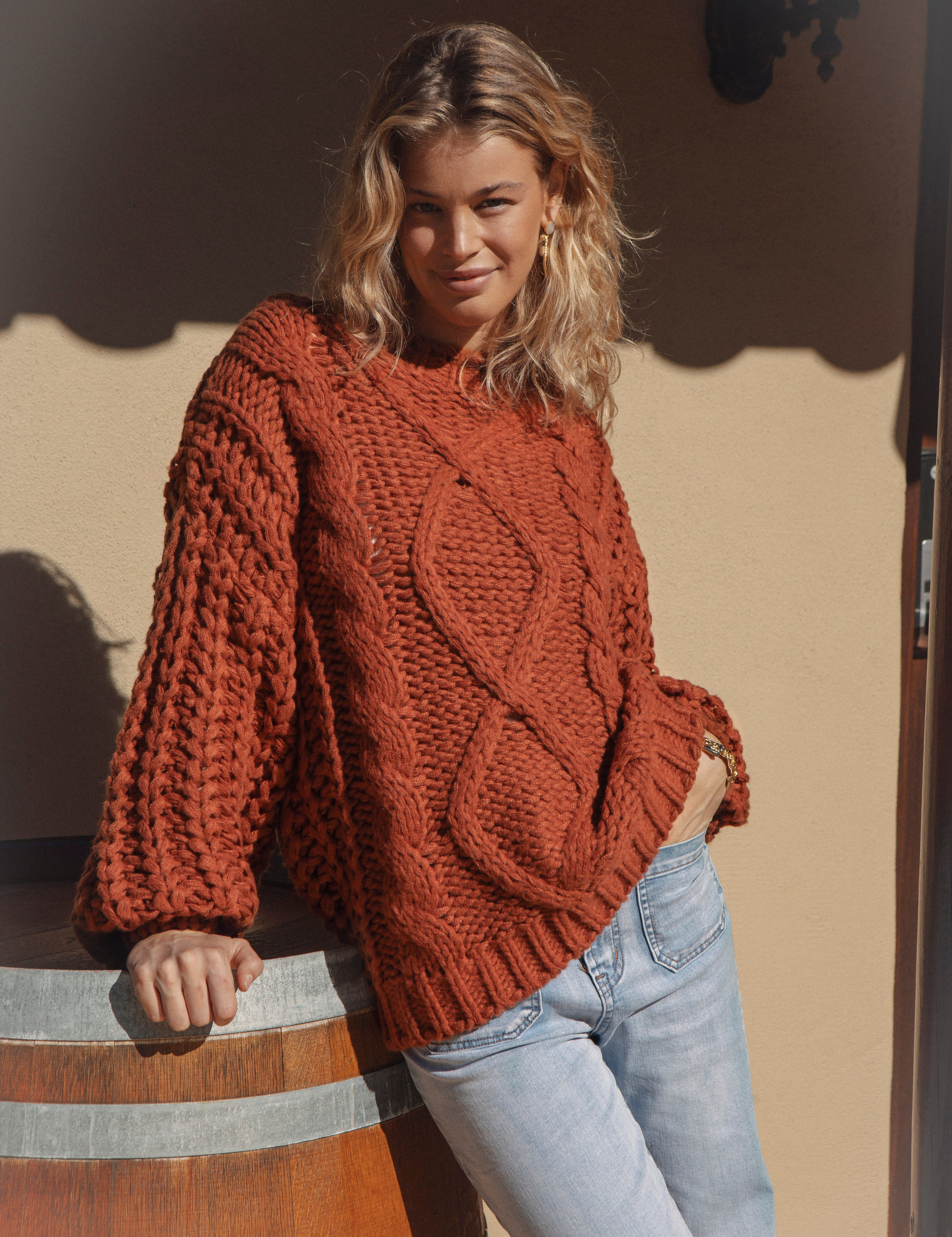 Wildwood Sweater in Ember features a beautiful rust colourway and chunky cable knit