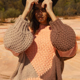 Wrangler Knit - Dune. Chunky knit in dynamic block pattern in peach and brown colourway.