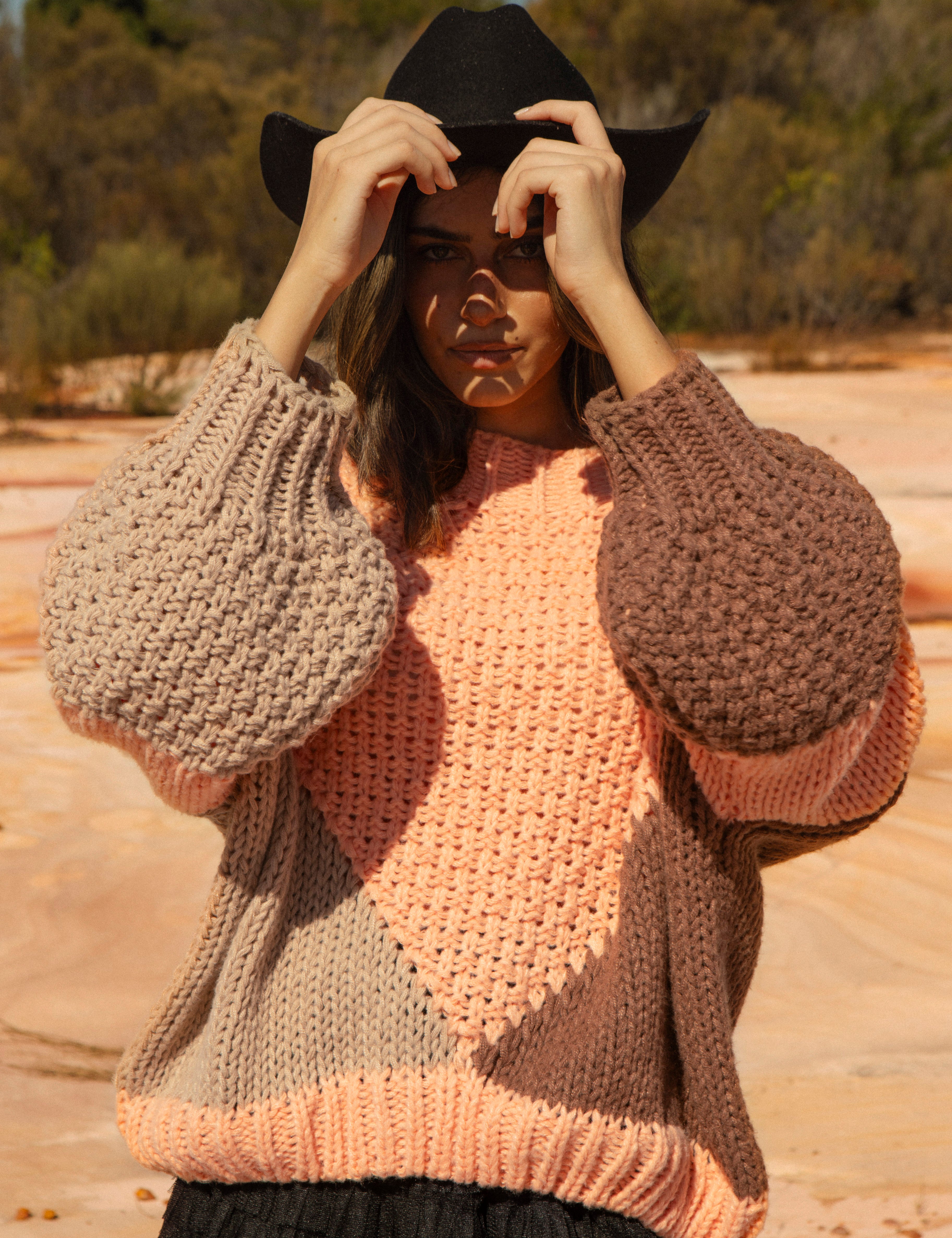 Wrangler Knit - Dune. Chunky knit in dynamic block pattern in peach and brown colourway.