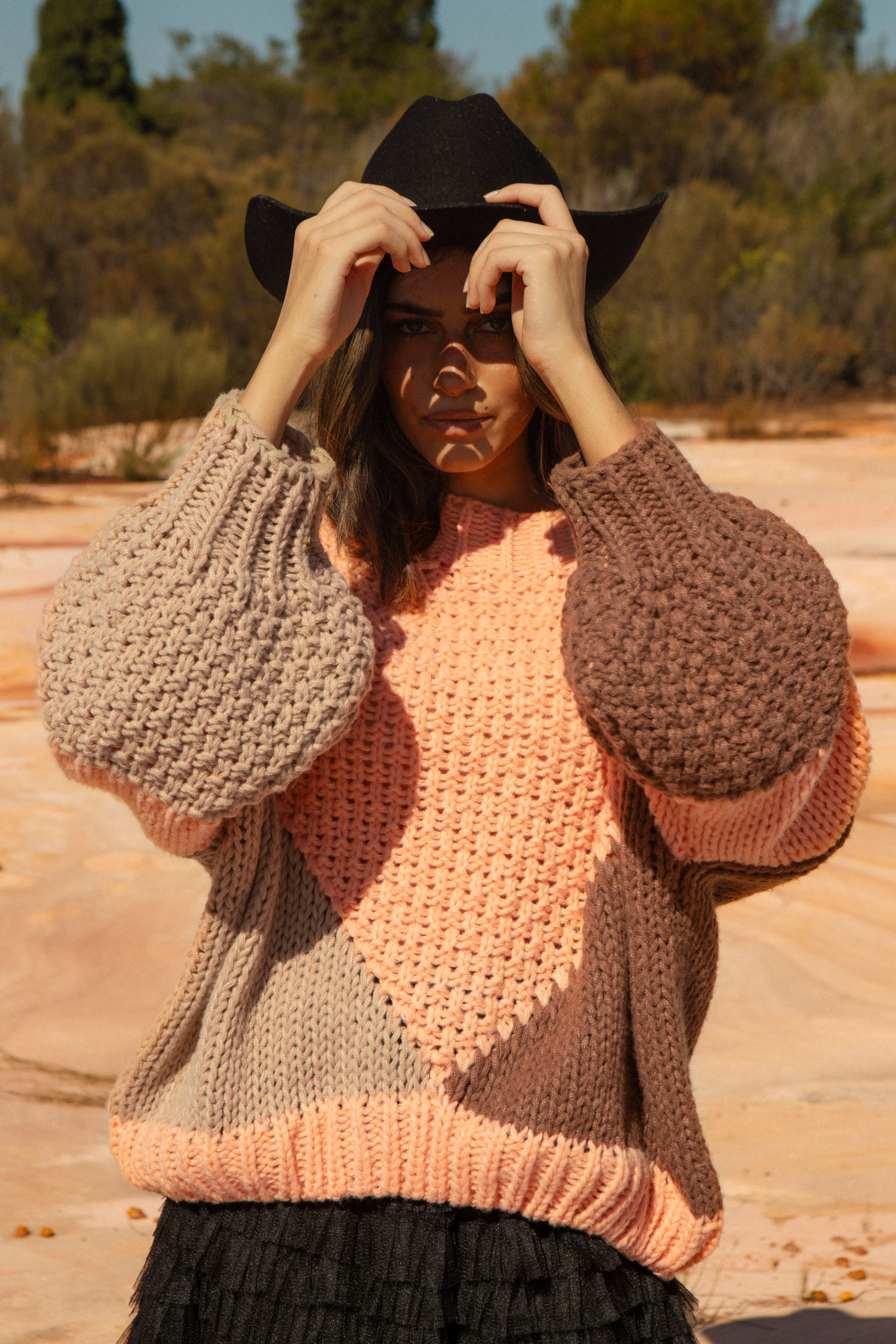 Wrangler Knit - Dune. Chunky knit in dynamic block pattern in peach and brown colourway.