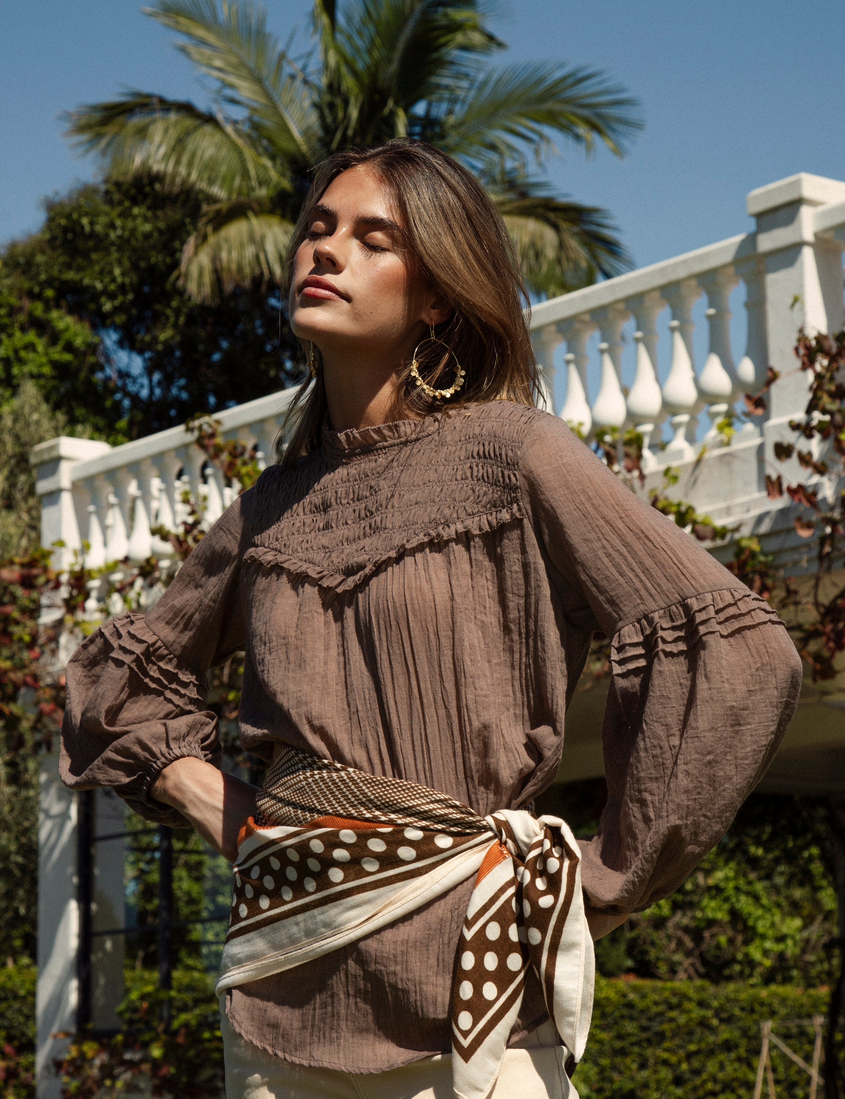 Zimmie Peasant Blouse Chocolate features long sleeve style, shirred bodice and brown colourway
