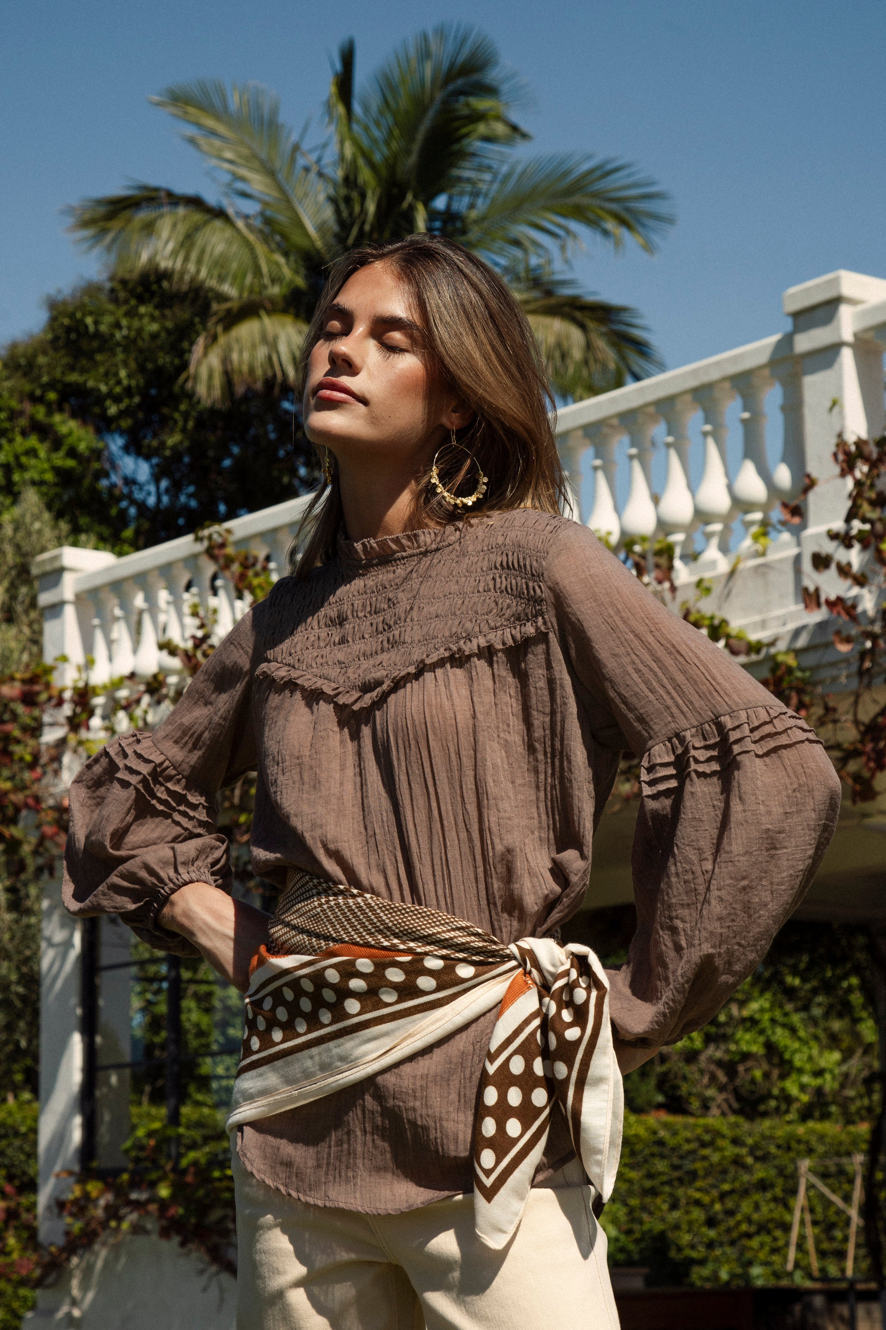 Zimmie Peasant Blouse Chocolate features long sleeve style, shirred bodice and brown colourway