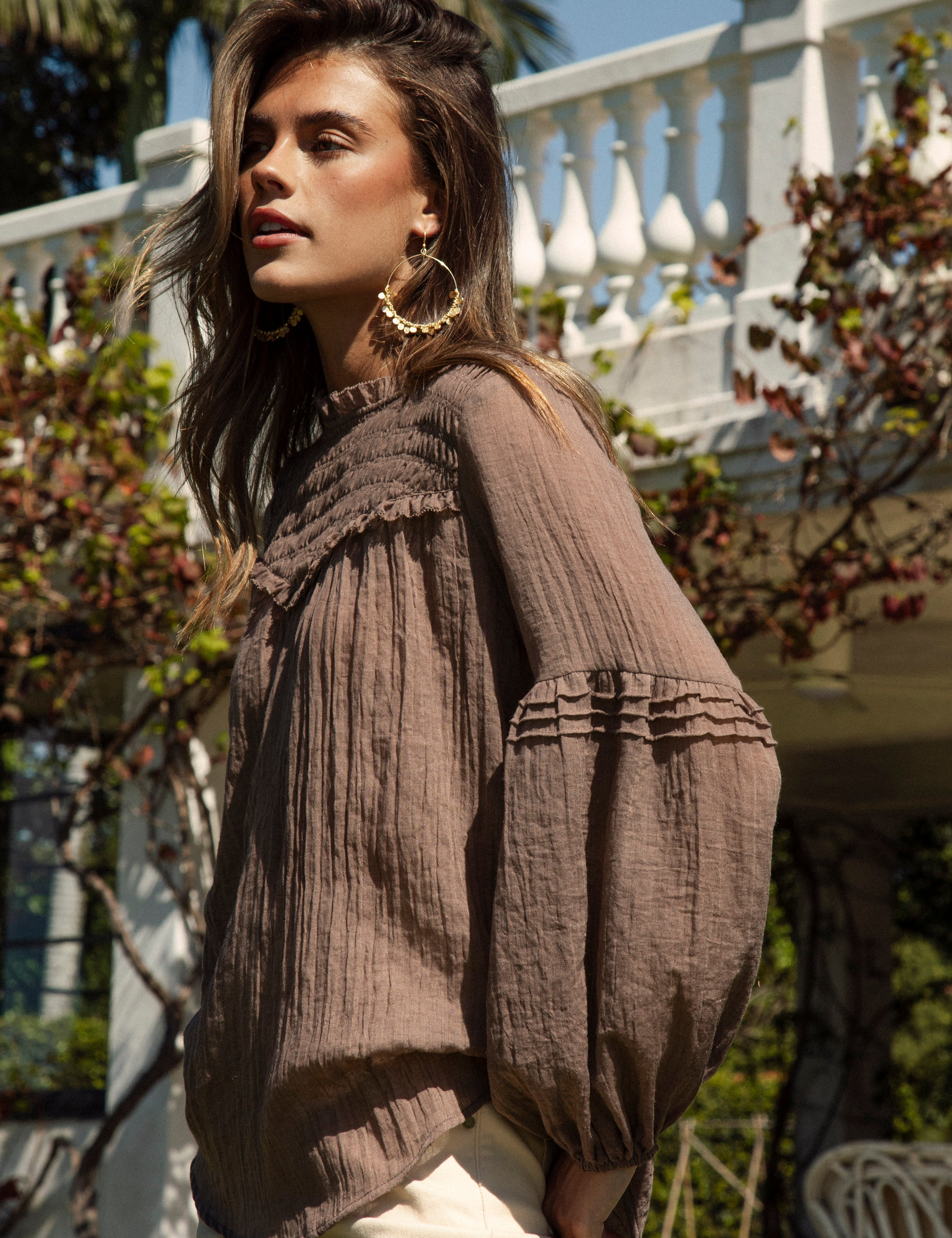Zimmie Peasant Blouse Chocolate - side view showcasing long sleeves with ruffle detail