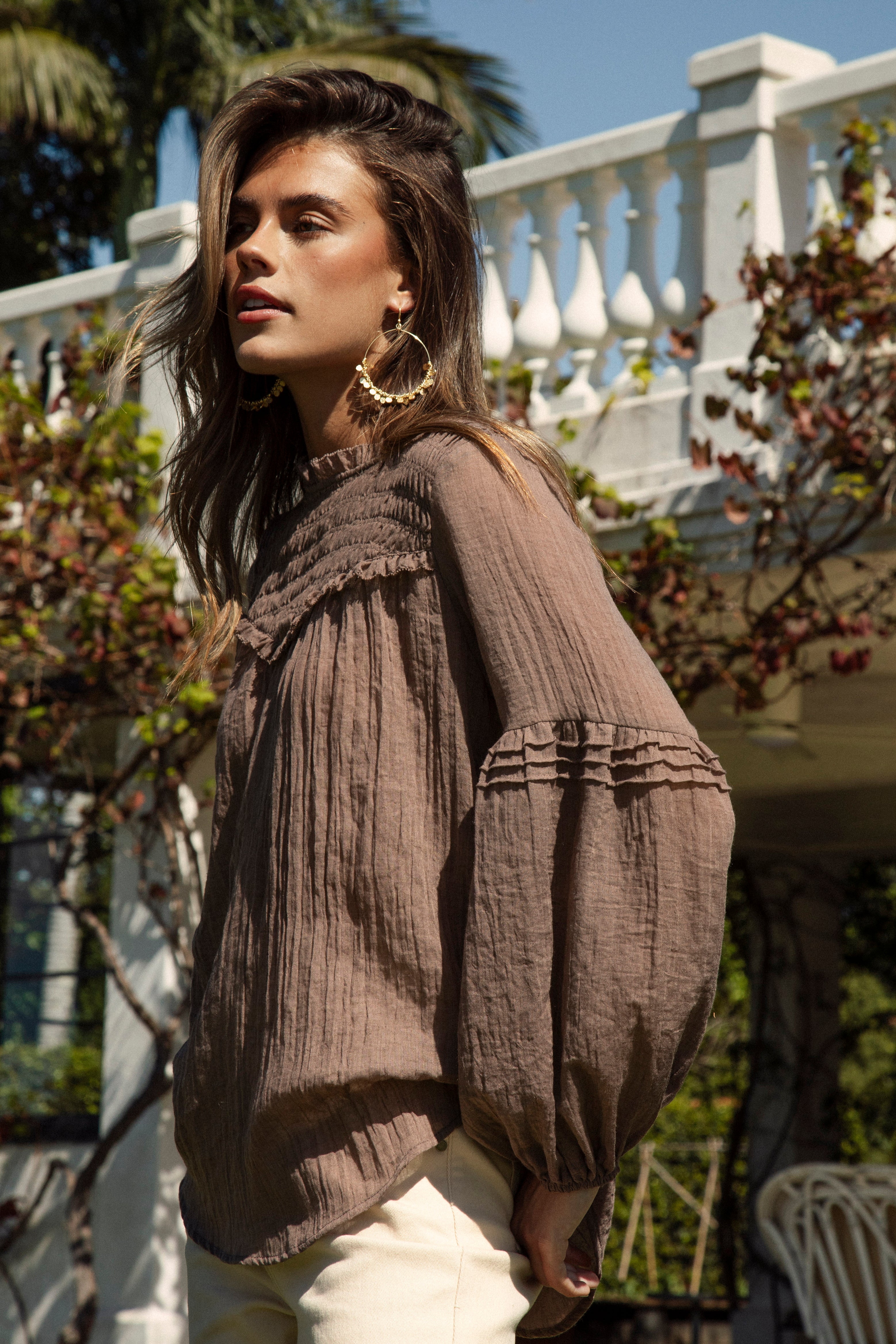 Zimmie Peasant Blouse Chocolate - side view showcasing long sleeves with ruffle detail