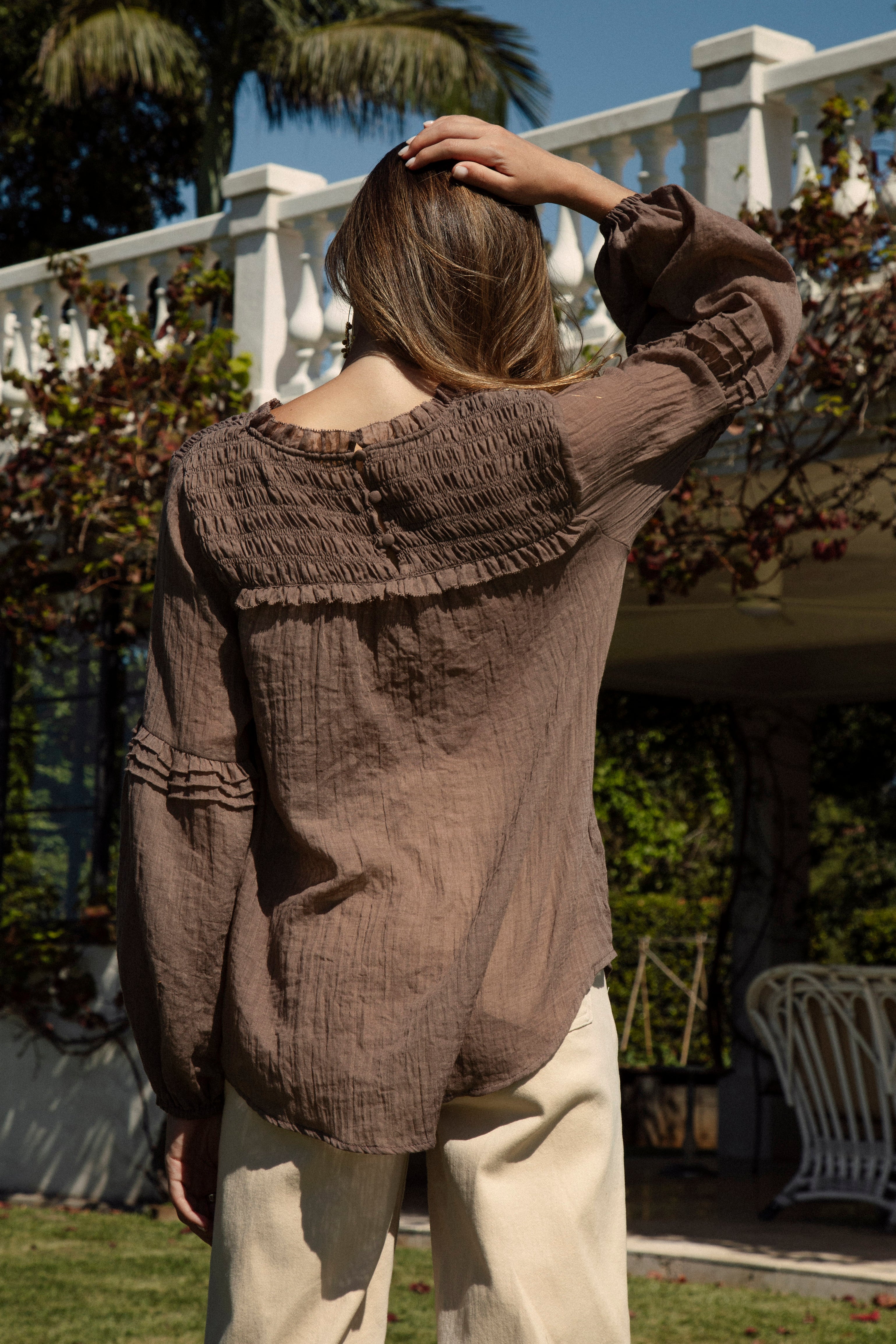 Zimmie Peasant Blouse Chocolate - showcasing shirred bodice at rear