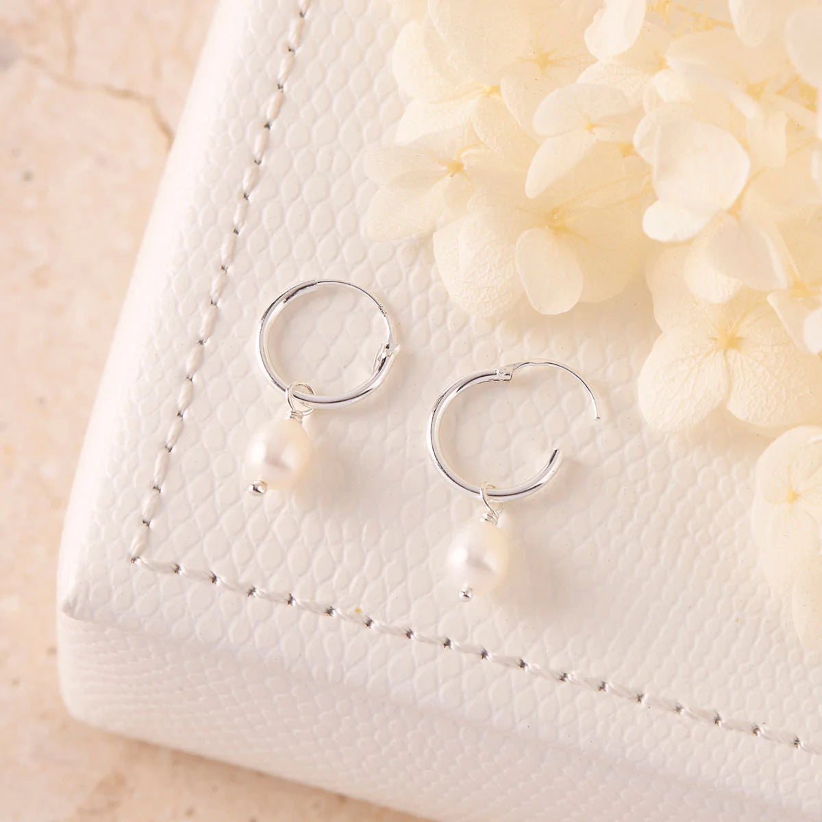 E853PL - Delicate Pearl Sleepers