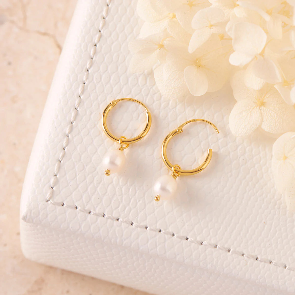 Midsummer Star Delicate Pearl Sleepers Gold