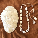 Choker crafted with white cowrie shells